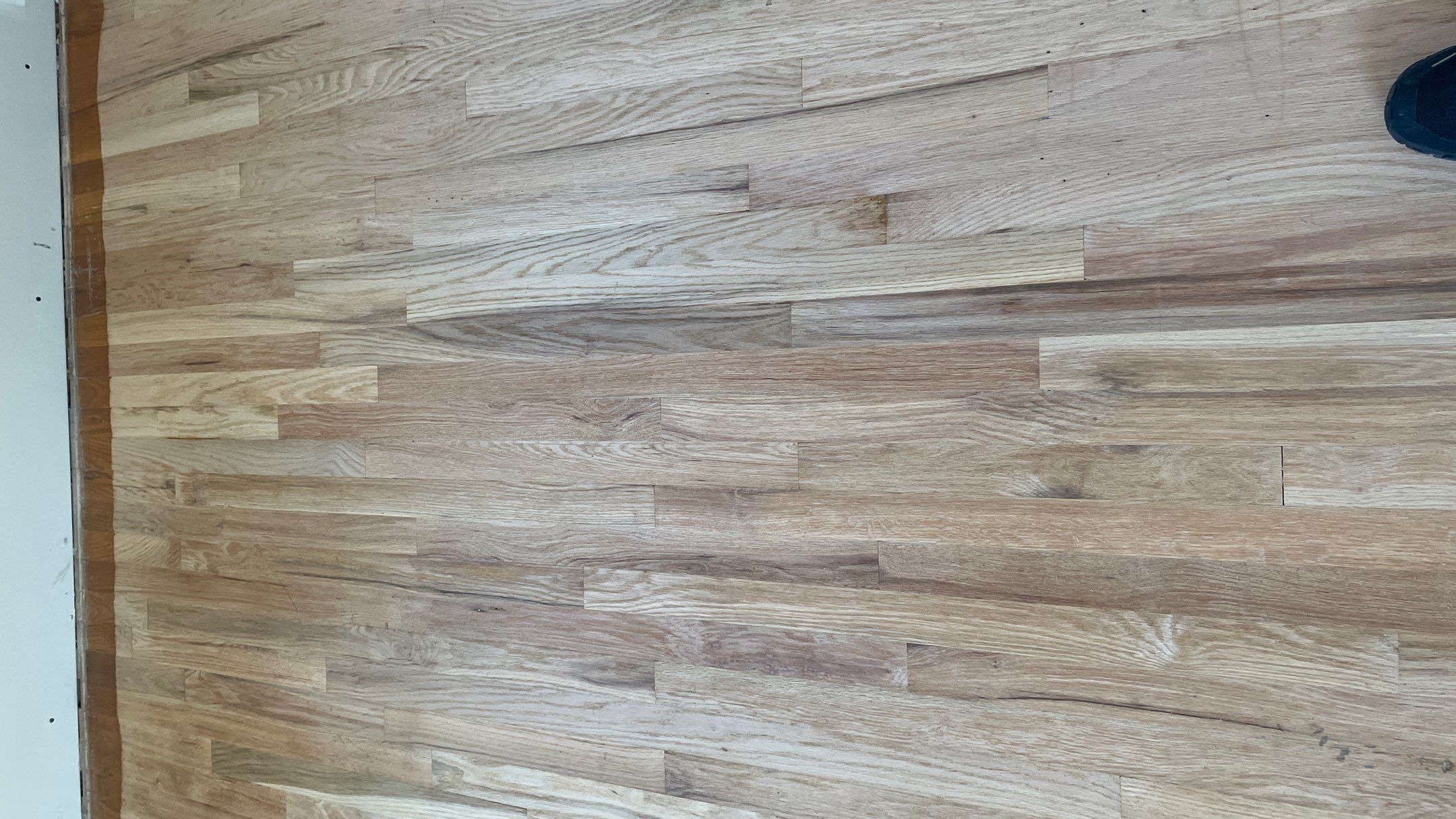 Remodeled Home with new tile floors, Showers and Refinished Oak Floors with stain and Waterbased Finish by Footprints Floors of Coastal Carolina