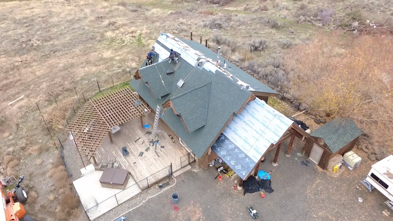 Residential Roofing Replacement on Custom Log Home in Tieton by Alpine Roofing