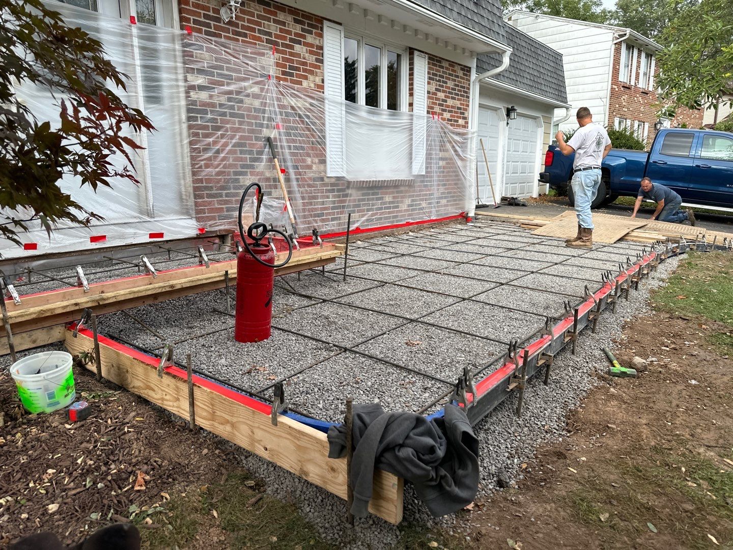 Ashlar slate stamped concrete patio  by NG Masonry & Construction LLC