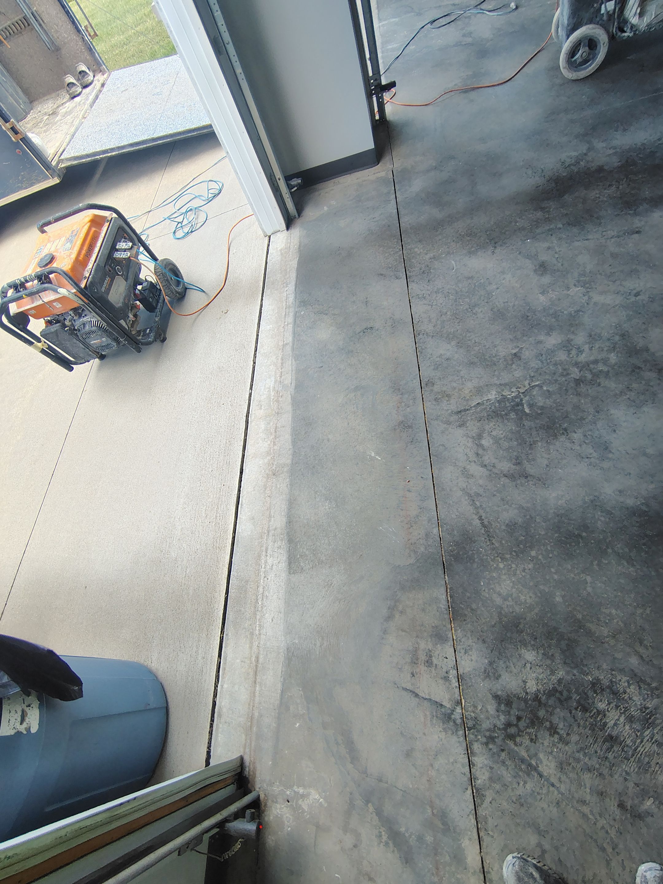 Multi-Car Garage Concrete Coating and Crack Repair in Dell Rapids by Select Painting, Coatings & Garage Cabinets
