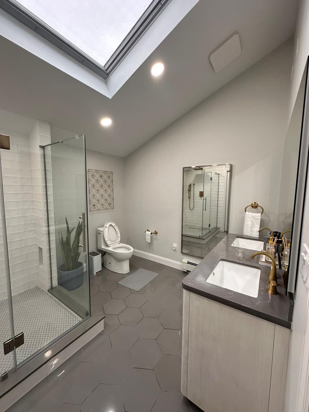 Bathroom Remodel using Tile by Home Concepts Construction
