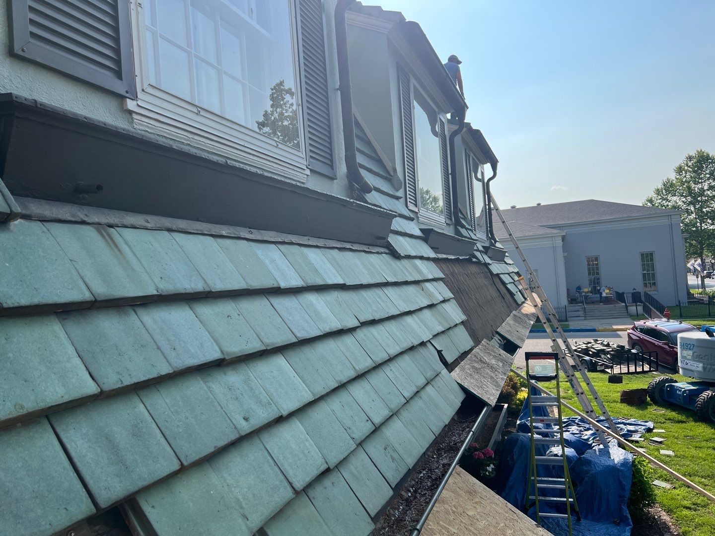 Slate removal/Cedar Shake replacement by Storm Contracting 