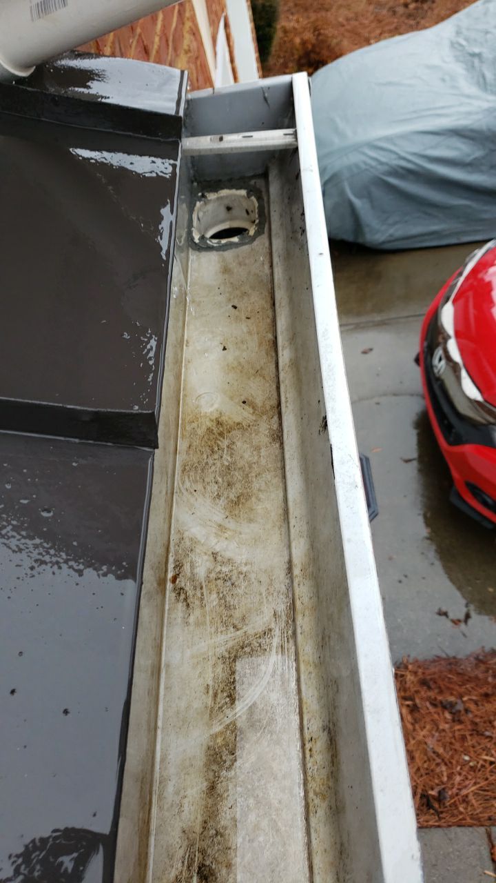Gutter Cleaning using water by G&H Home Tech Pros LLC