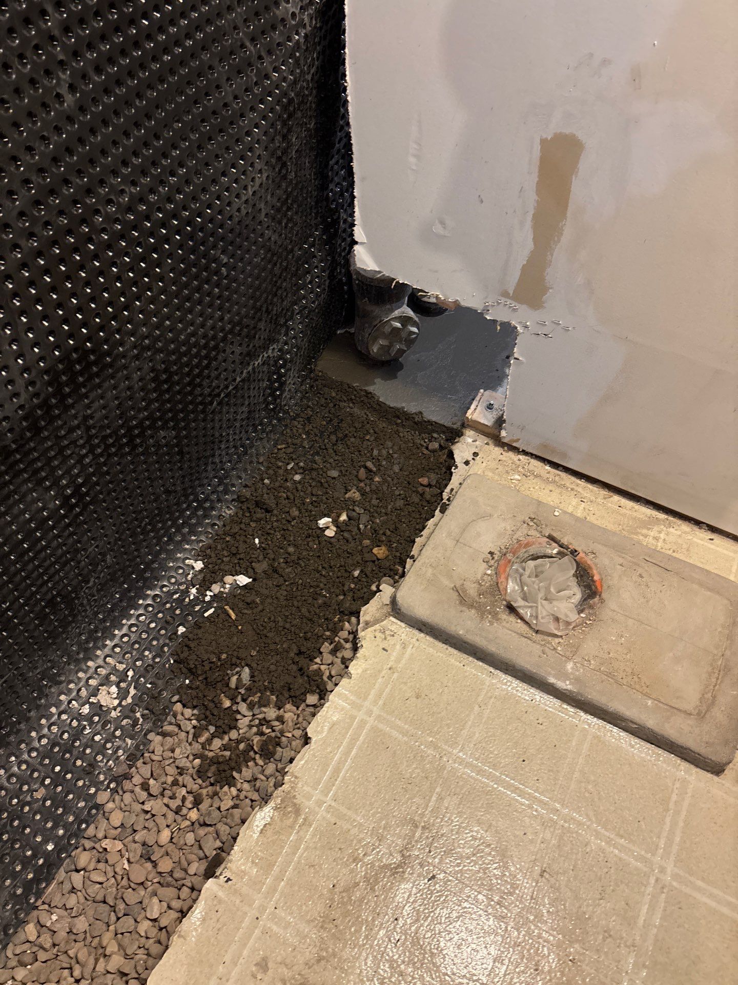 Interior Drain Tile & Buried Discharge in South Minneapolis by Waterproofing Northeast