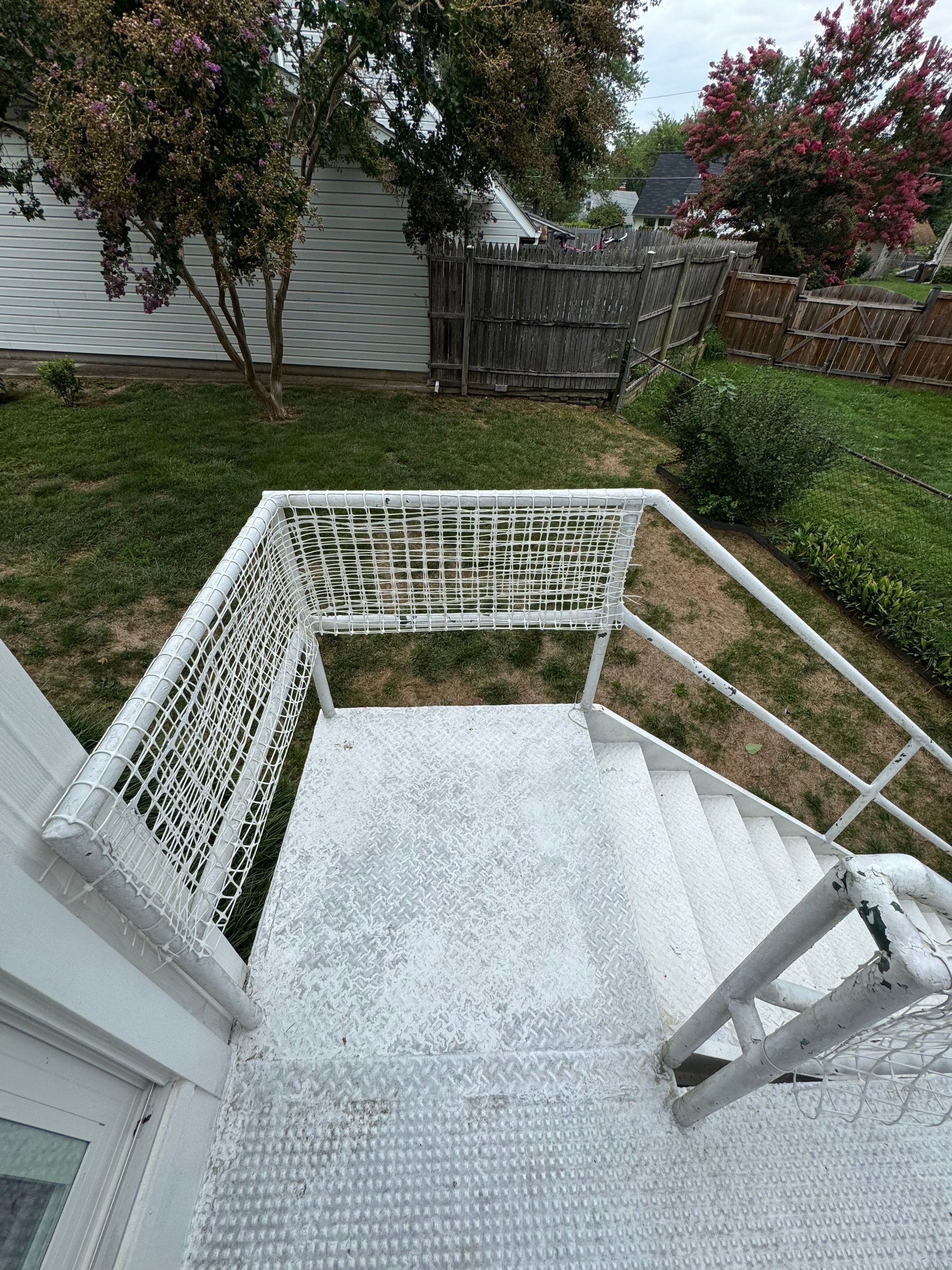 White Powder-Coated Outdoor Railings in Rockville & Staircase and Deck Refurbishment  by Capitol Iron Works