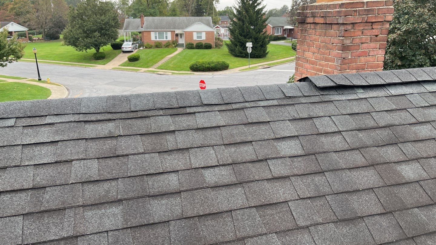 Residential Roofing Installation using Atlas Pinnacle Pristine Black Architectural Shingles by Frederick Roof Repair