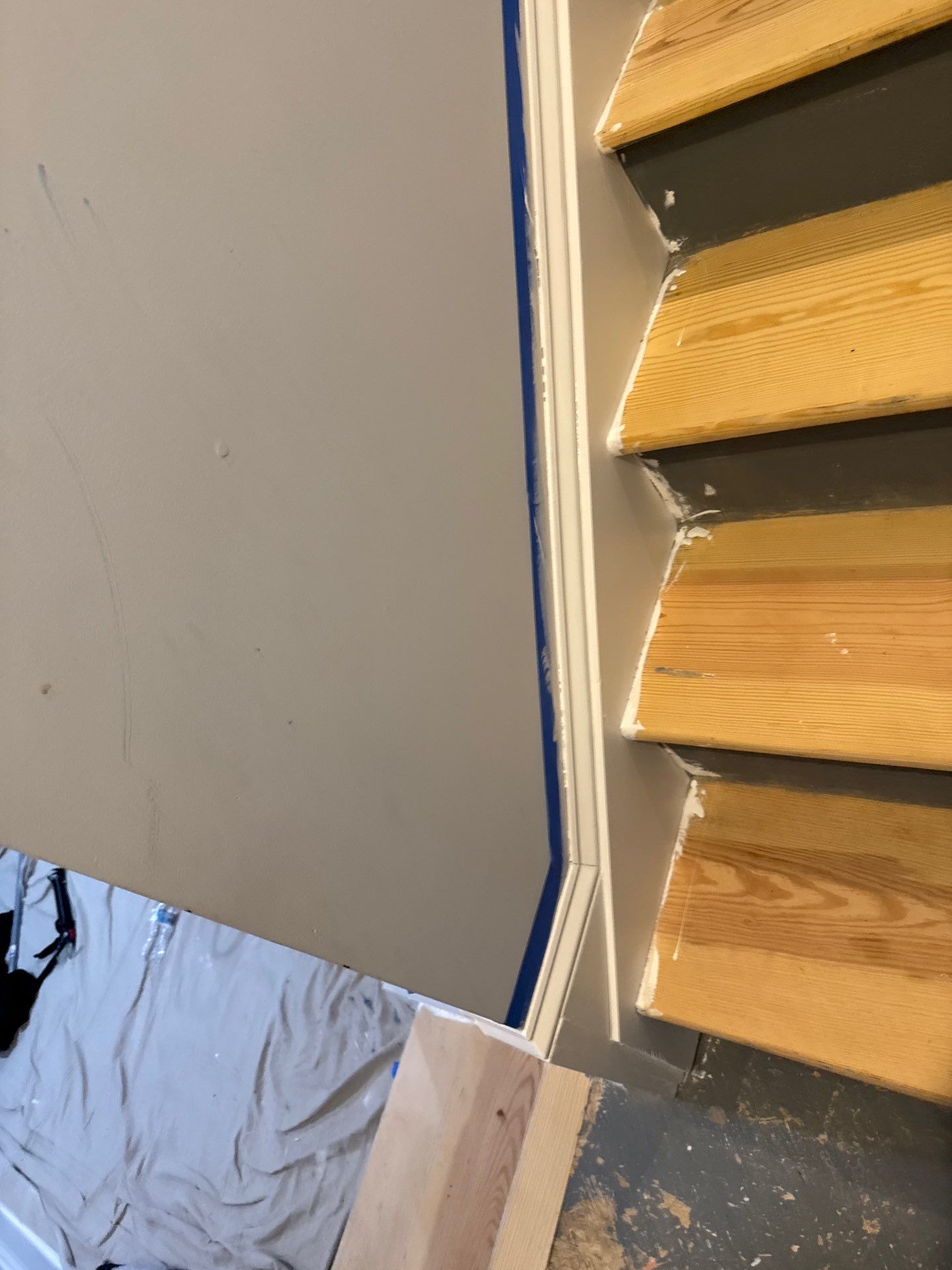 Stairway Installation using t vinyl stair tread and reversibleriser by La Bendicion Contruction Llc