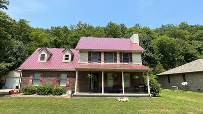 Residential Roofing Installation using Metal