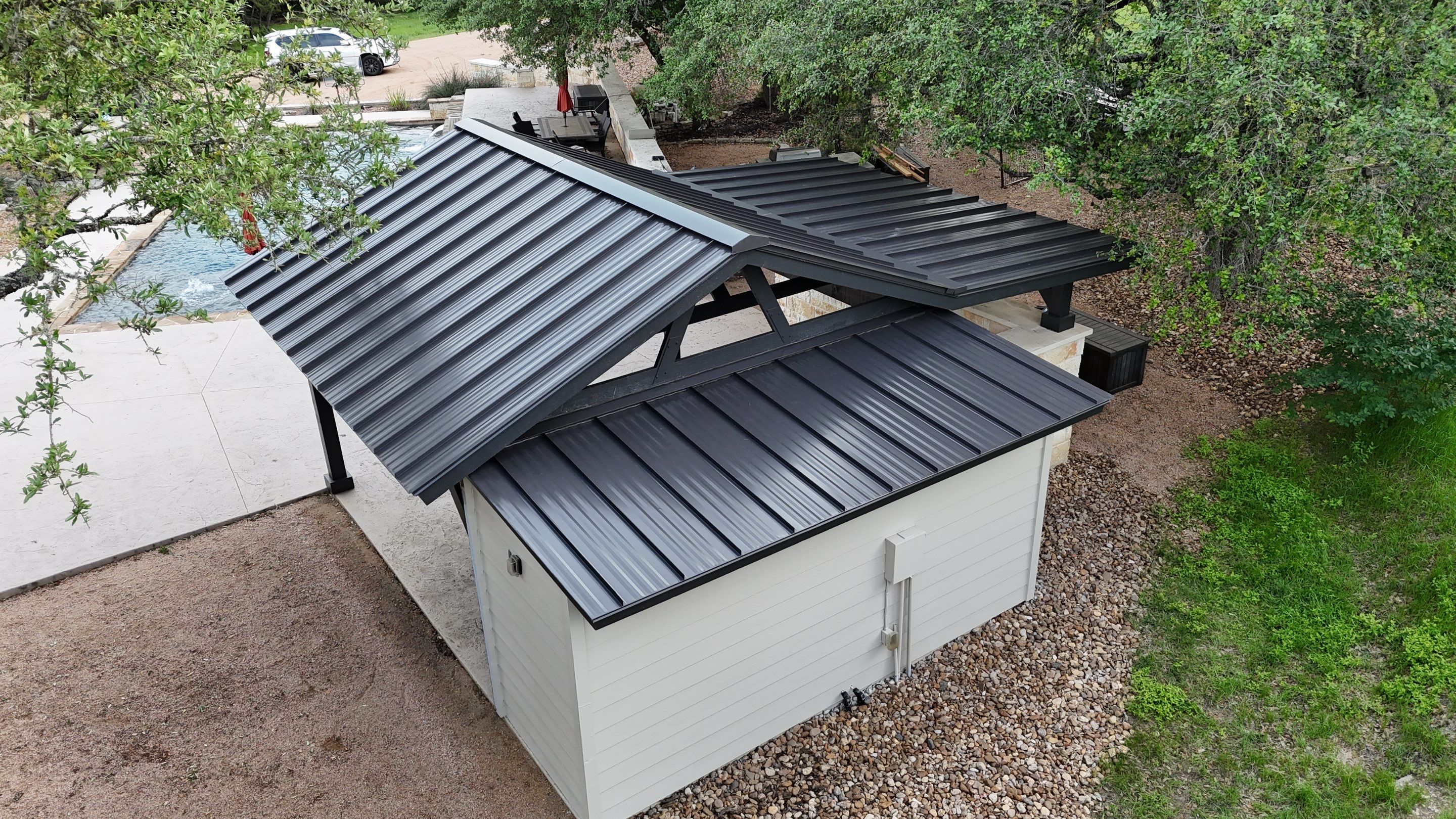 Dark Bronze Fully Striated panel by Wimberley Roofing