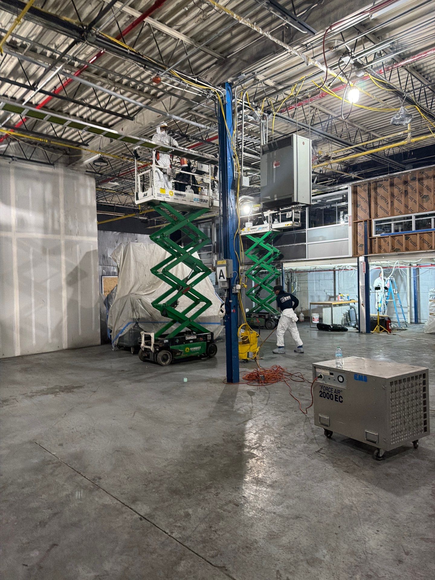 Industrial Warehouse Fire Damage Cleaning and Spray Sealing in Islandia by EMS Restoration Corp