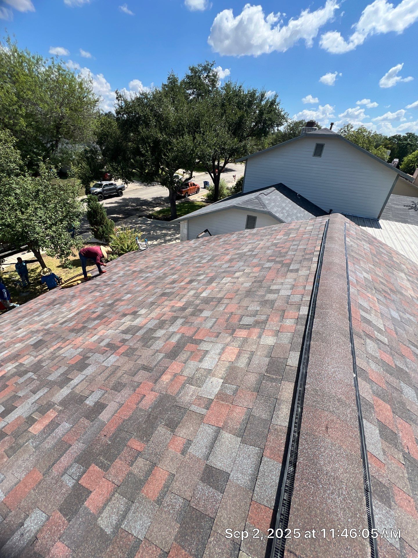 Merlot Roof Replacement & Tinted Skylight Installation | San Antonio, TX by Ayan Roofing