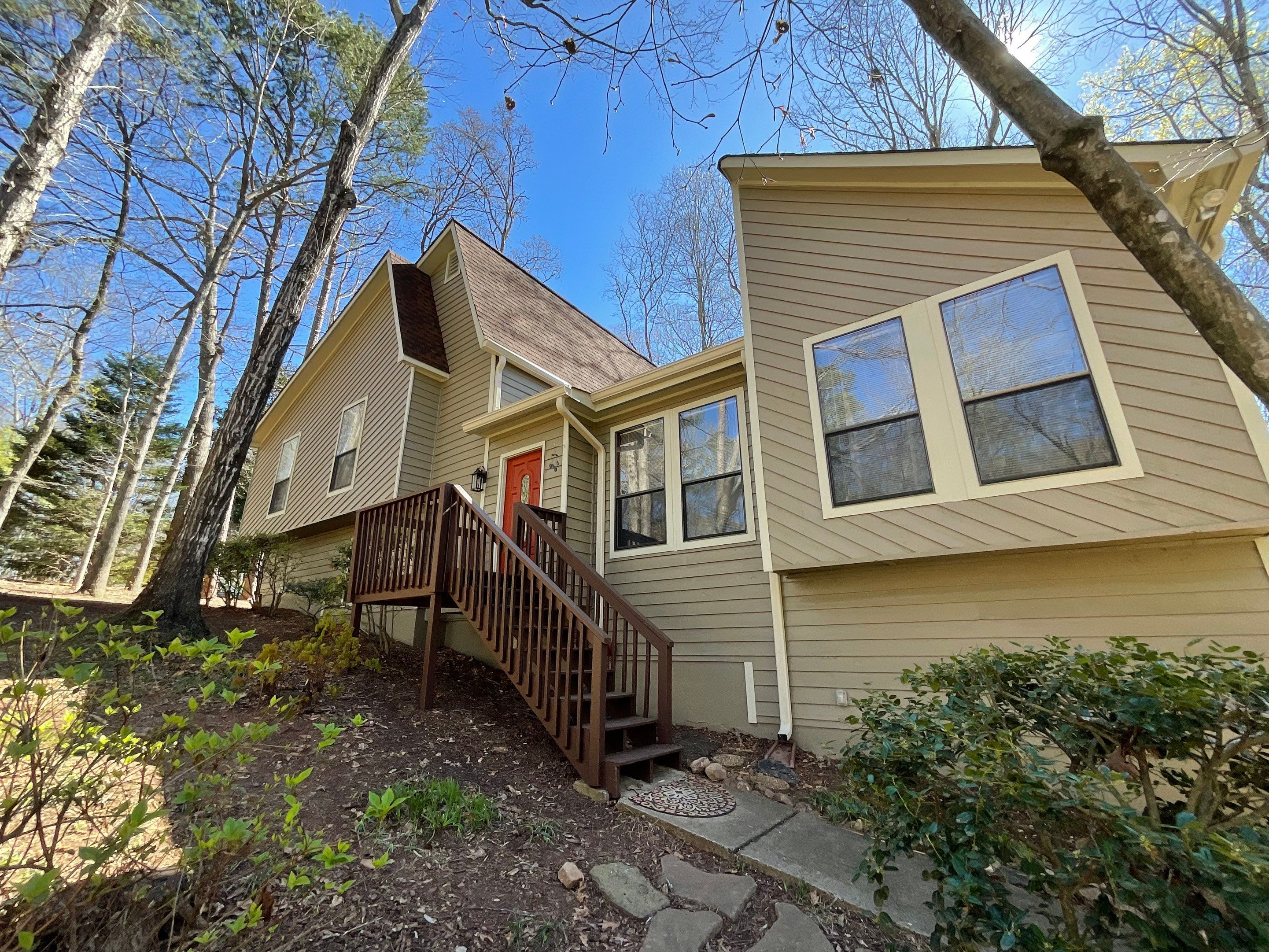 Exterior Painting and Deck Refinishing for an Acworth Residence by Swift Home Renovations