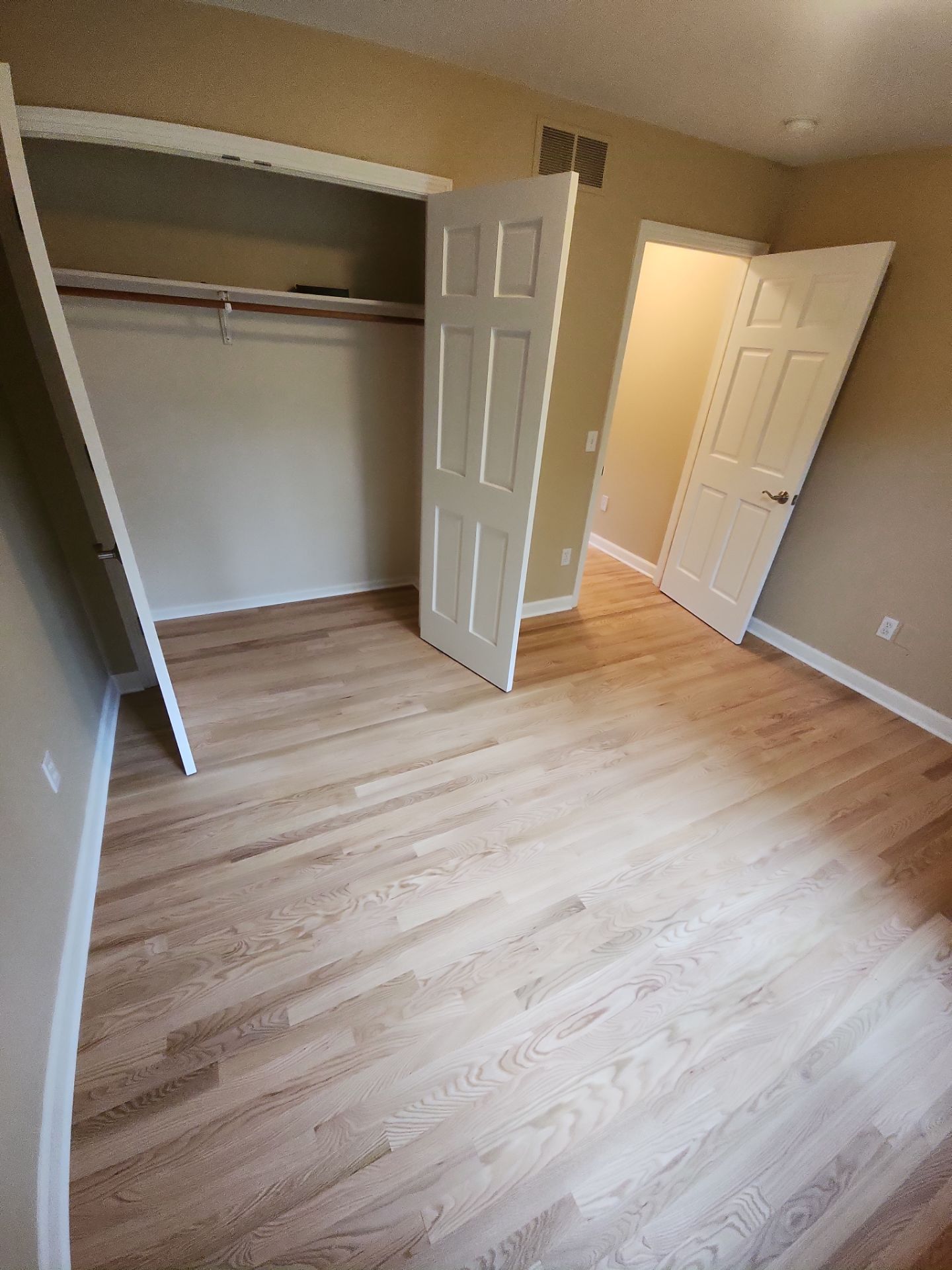 New Red Oak Natural bedroom and hall  by Ann Arbor Hardwoods 