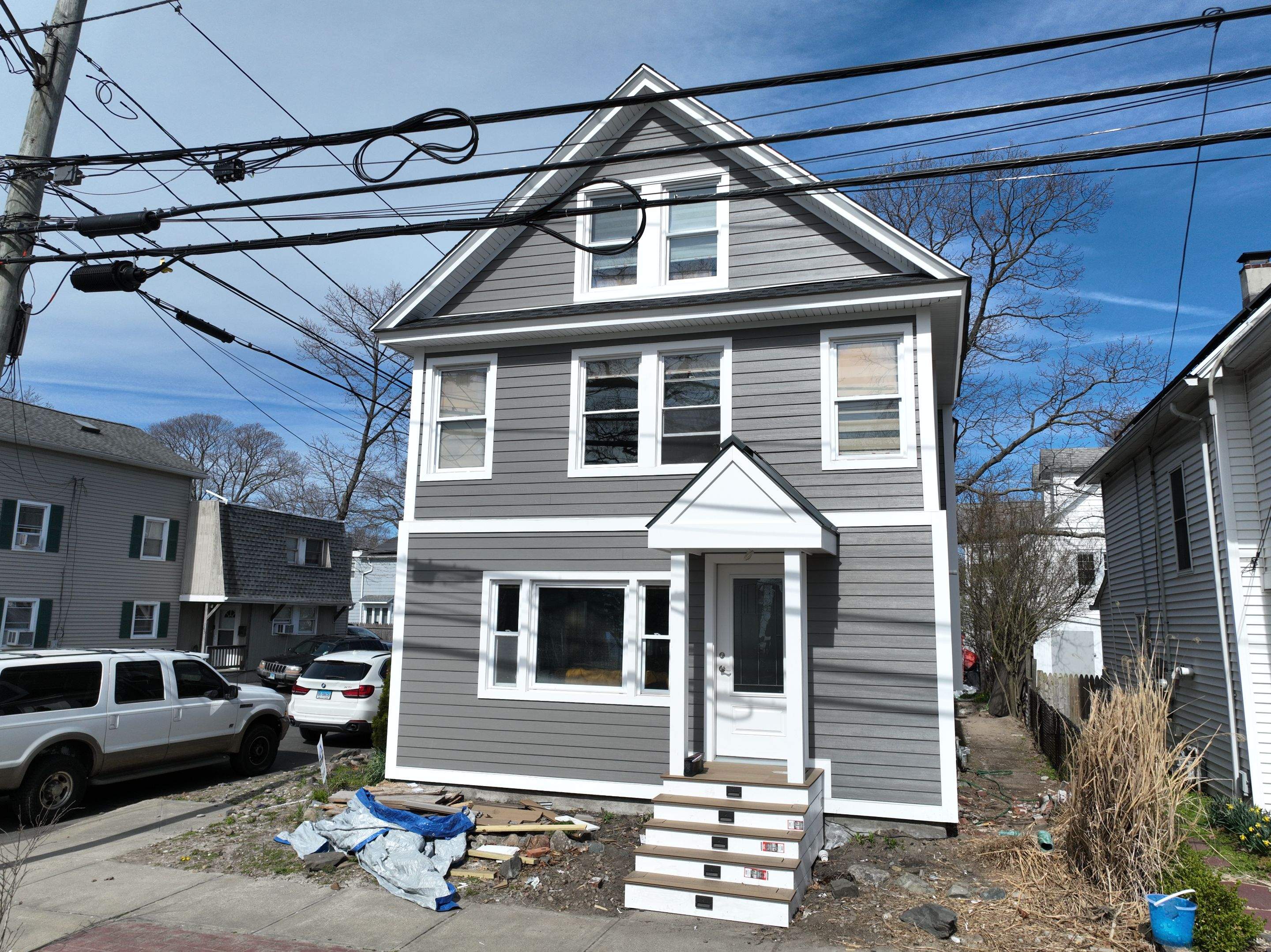 Siding Installation using Hardie Plank Aged Pewter by A Plus Exterior