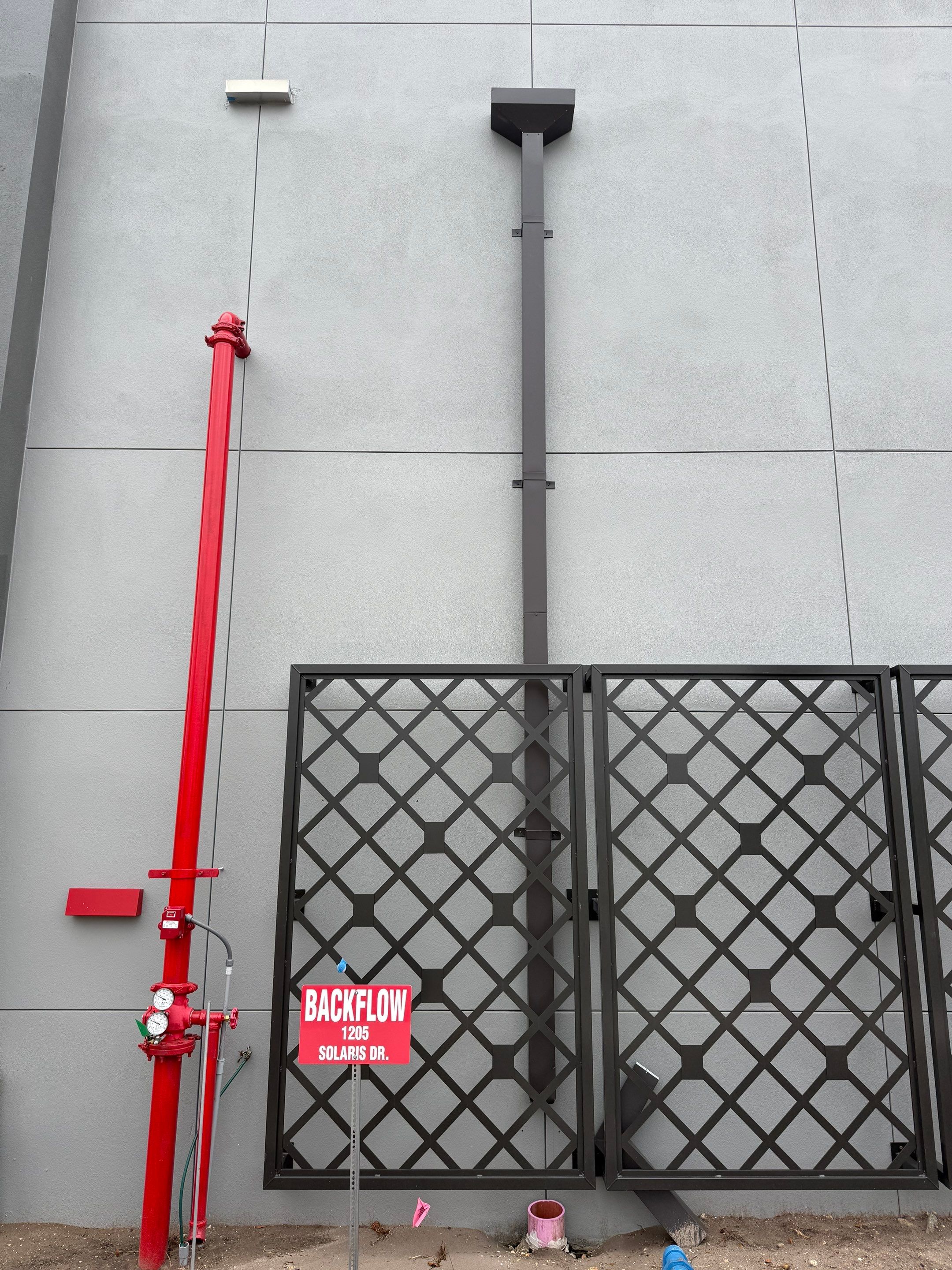 Downspout Installation using collector head in Cape Coral FL by Gutter Professors