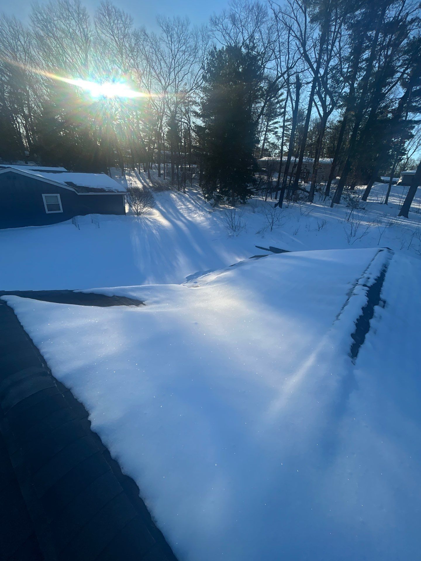 Ridge Cap Replacement & Black Metal Valley Installation in Chelmsford, MA by Mighty Dog Roofing of Greater Middlesex County