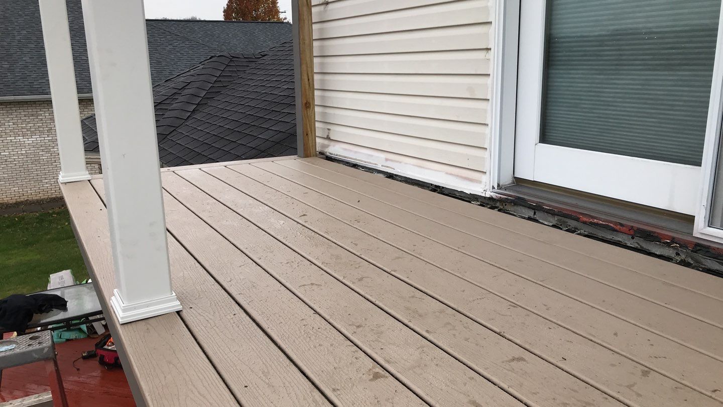 Deck Refurbush and Door Replacement using Trex Decking and Railing. Polaris Patio Doors by Secure Construction Company Inc