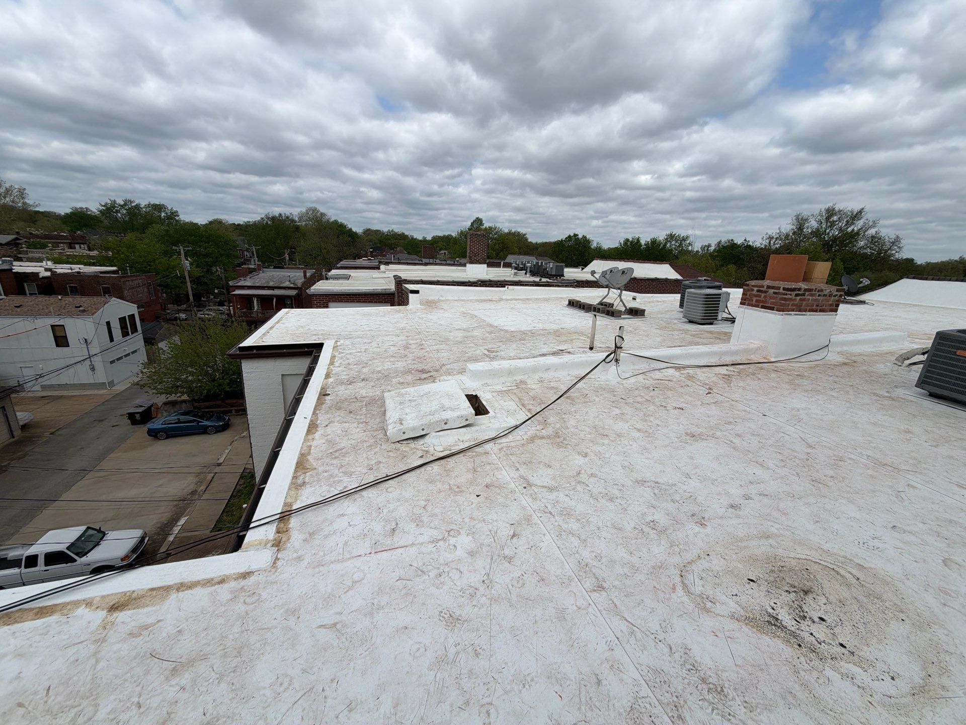 Multi-Family TPO Roof Installation and Masonry Repair in St. Louis by Acute Roofing And Exteriors
