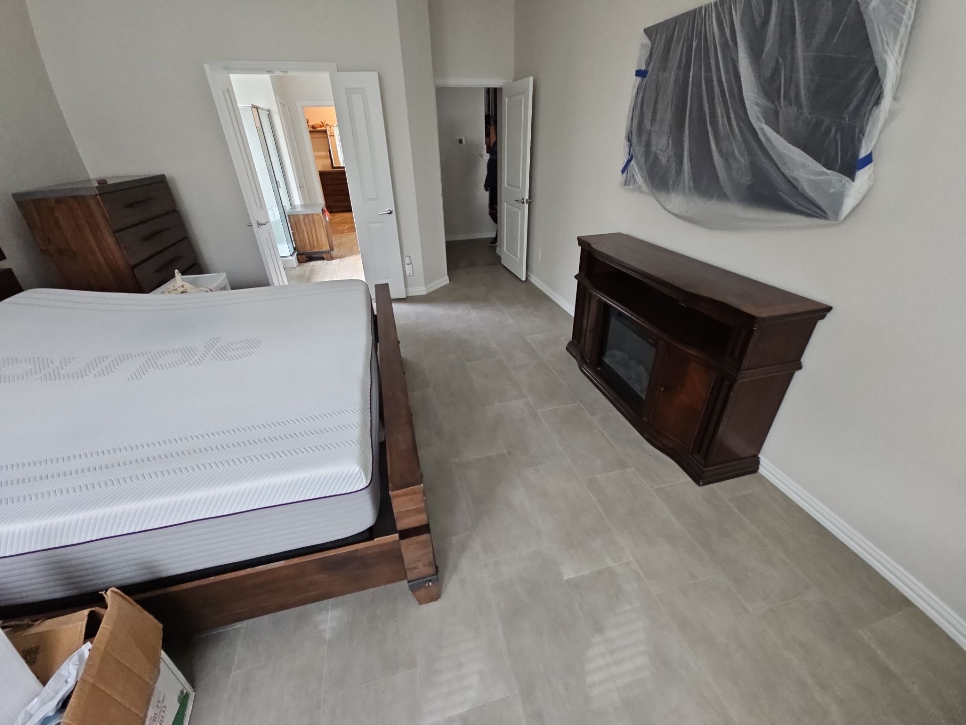 Carpet replacement with Tile and Red Oak Stairs by EL-GC LLC 