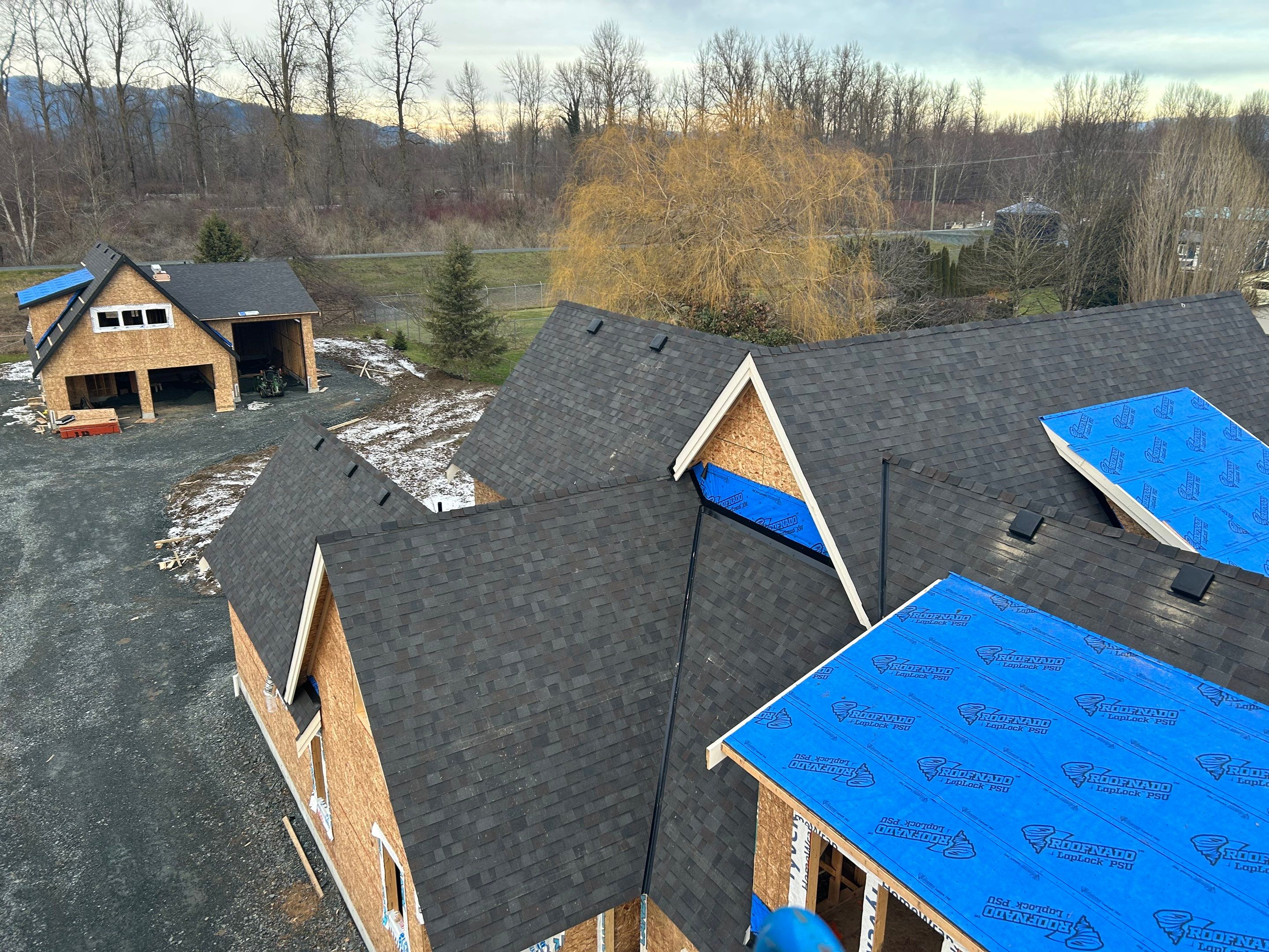 Residential Roofing Installation using Malarky Vista Shingles and Prolok Metal  by Top Notch Roofing Inc