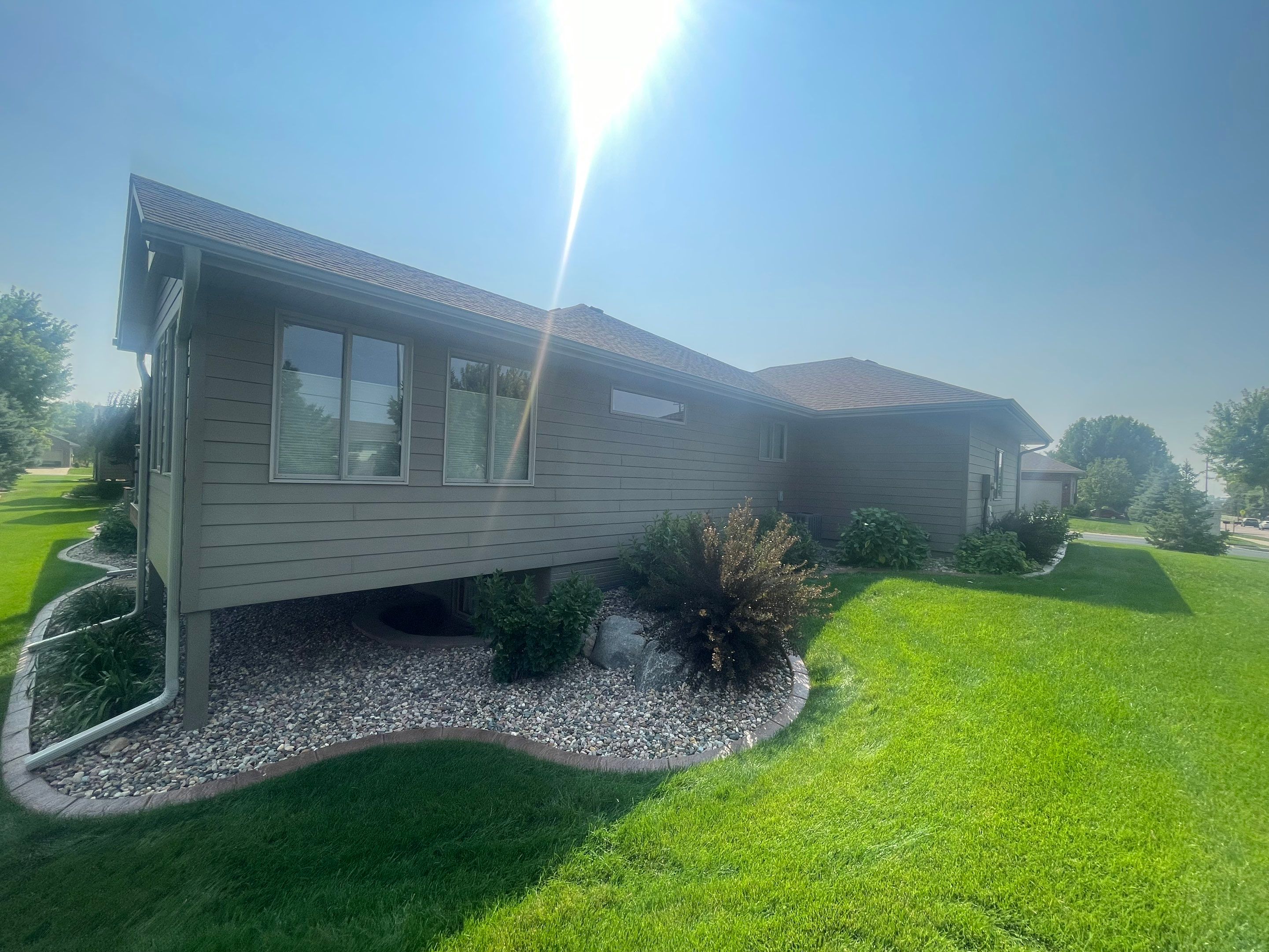 Residential Exterior Siding and Trim Painting in Sioux Falls by Select Painting, Coatings & Garage Cabinets