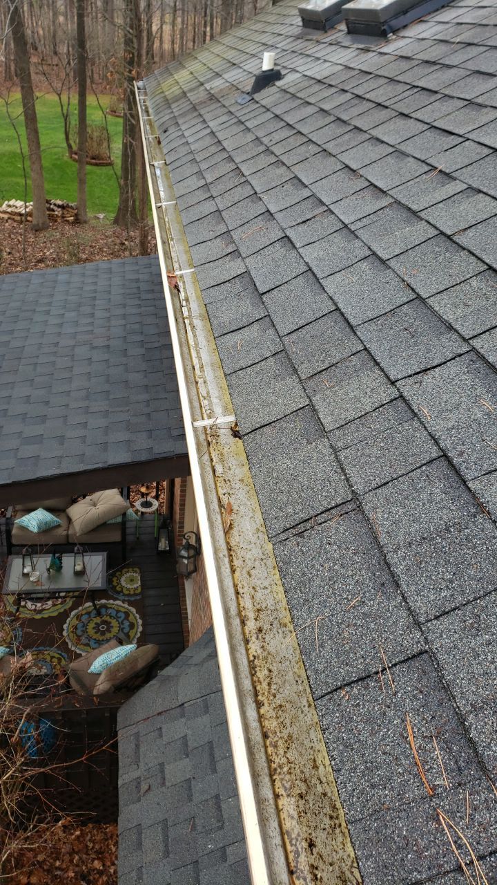 Gutter Cleaning using water by Power Wash Masters LLC