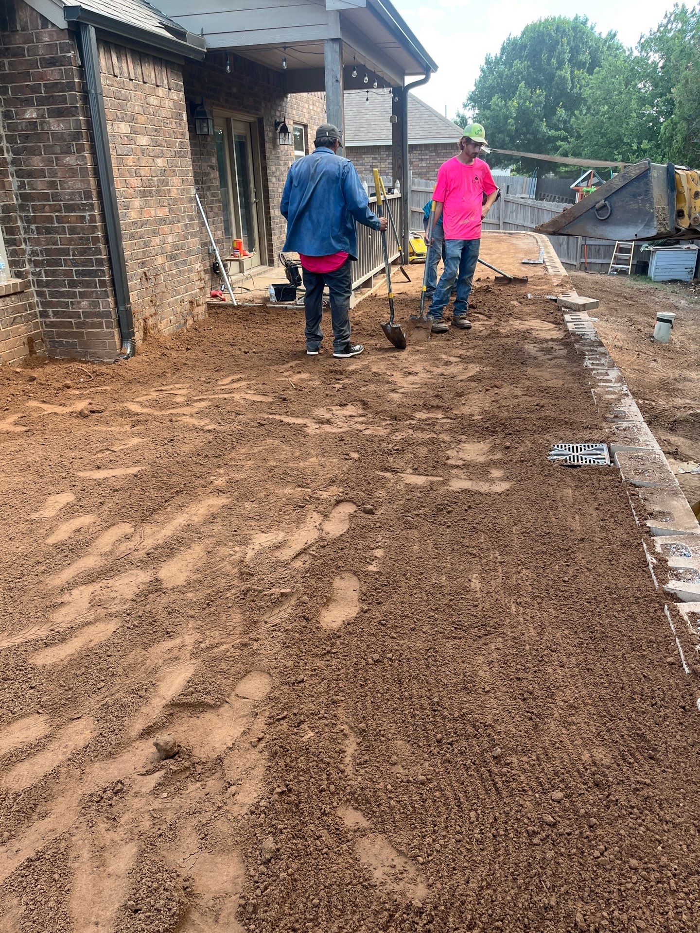 Custom Segmental Block Retaining Wall and Sod Installation in Lawton by Clays Services Inc