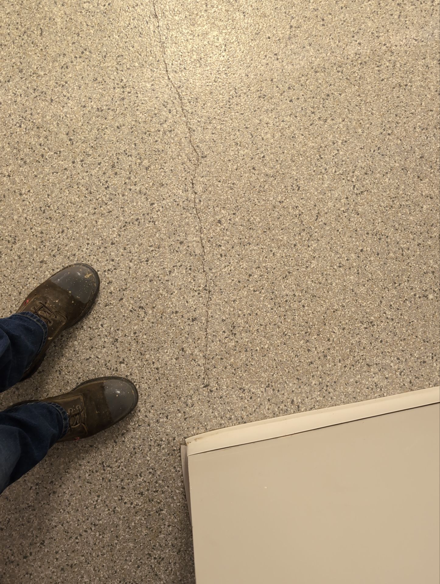 Medina Cracked basement floor with Epoxy by Beck Restoration Management Group