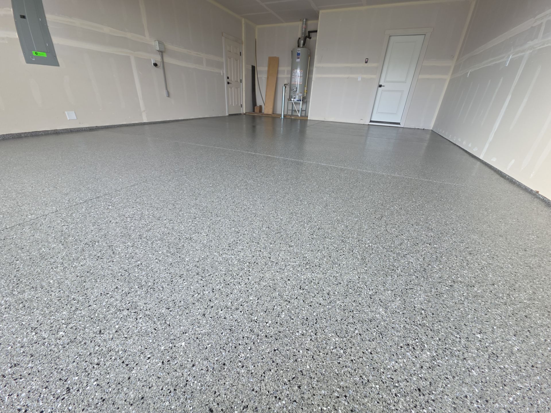 Garage Transformation using Slate Hybrid by Croc Coatings, LLC