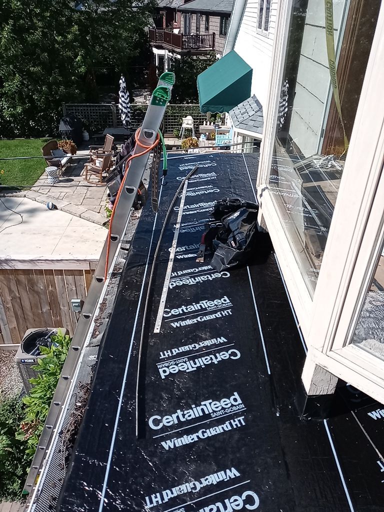 Residential Roofing Installation, Dec-tek walk-out porch roof, siding on garage by Absolute Roofing and Construction