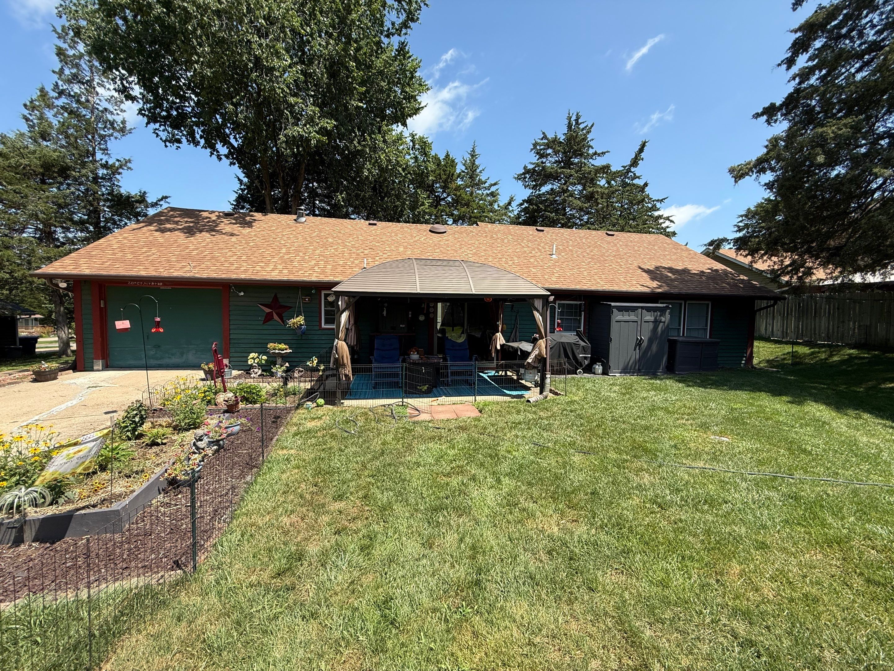 Wood siding refresh by Pezley Painting
