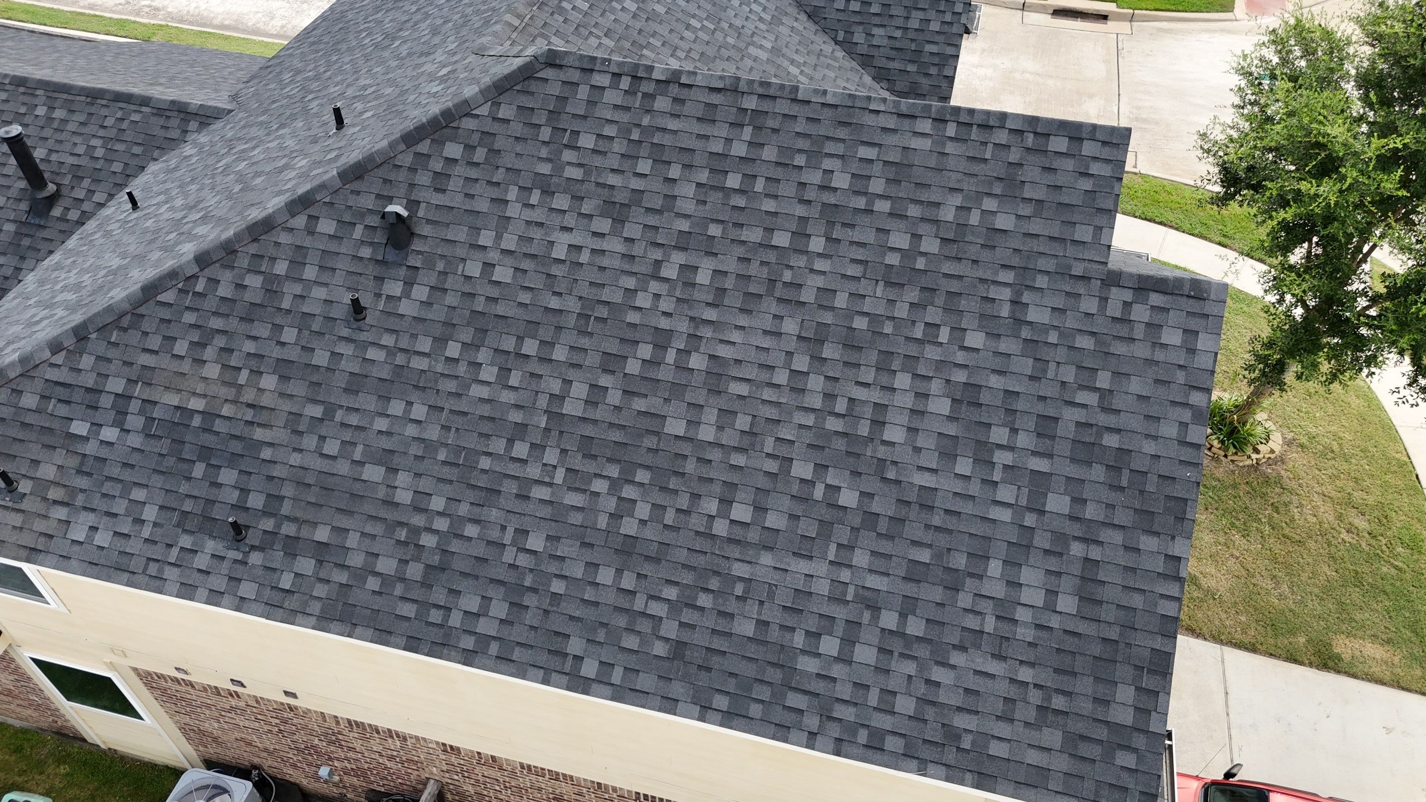 Residential Roofing Installation using IKO Dynasty after Storms in Cypress by Core Four Roofing