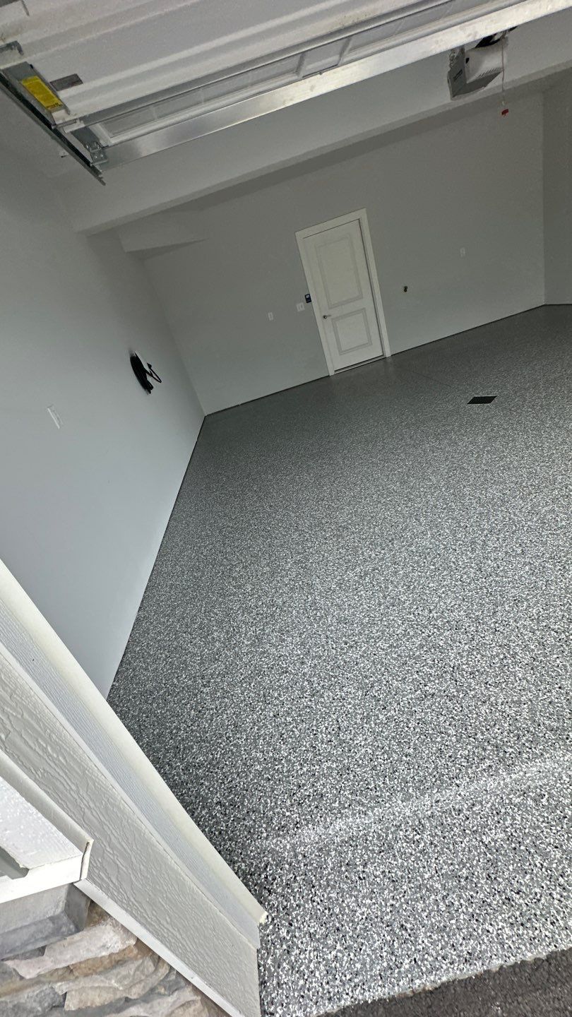 Porch + Garage Project in Evans City by Floors in a Day, Inc