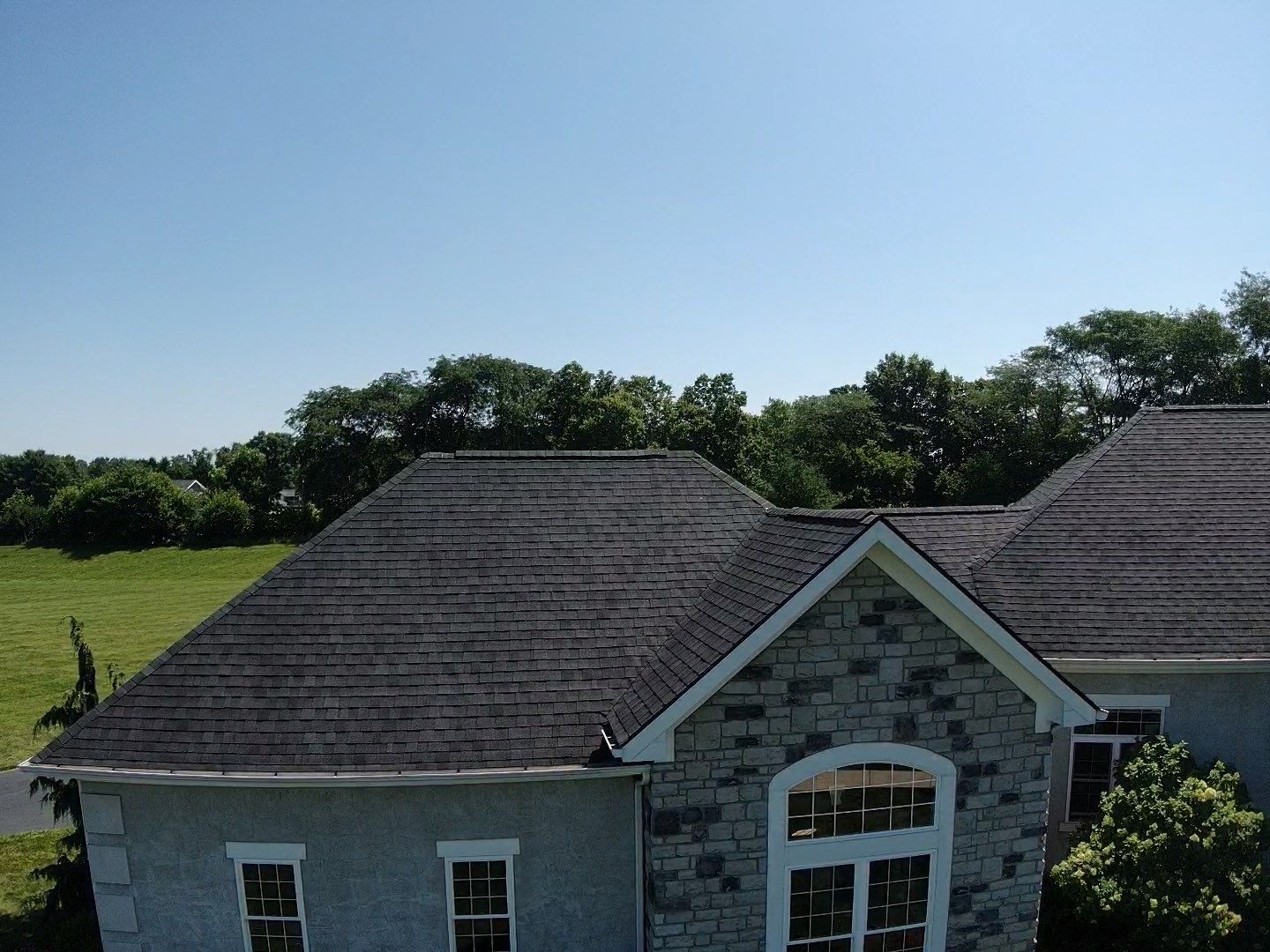 Residential Roofing Installation using Atlas Pinnacle Black Shingles by 614 Exteriors