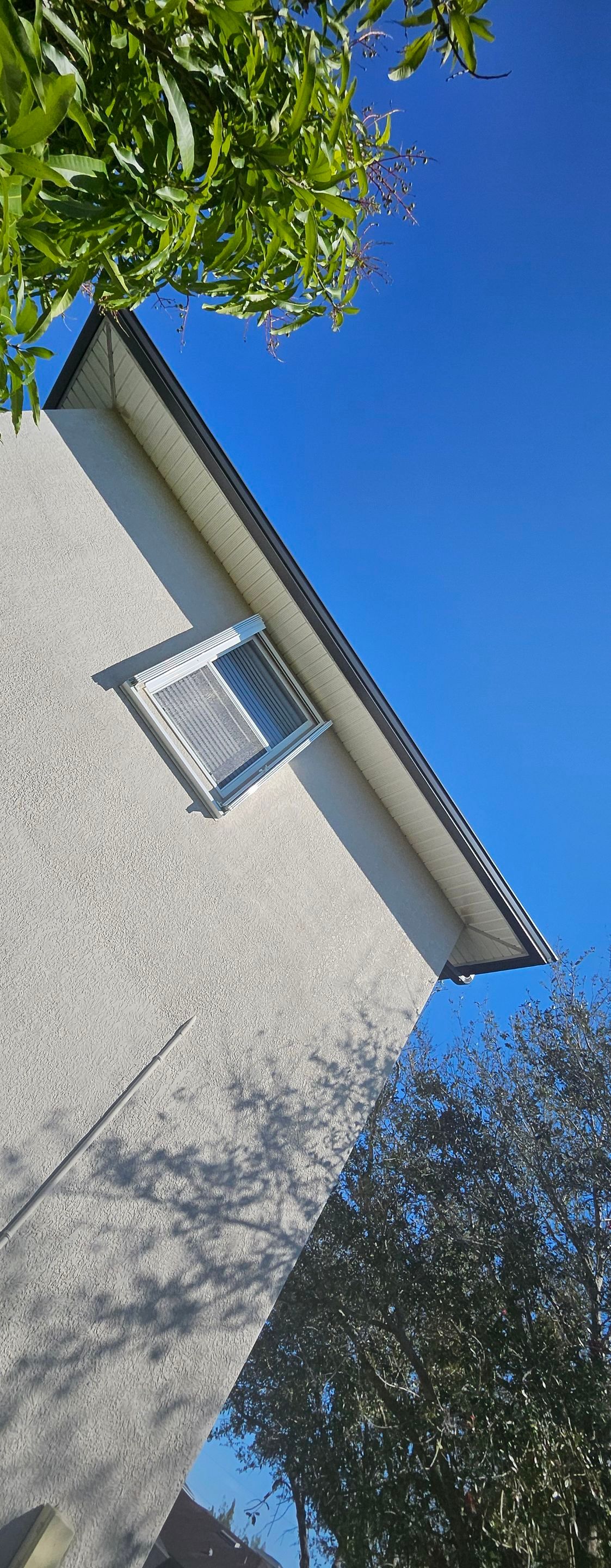 Dark Bronze Seamless Gutters using 6-Inch Seamless Gutters in Cape Coral FL by Gutter Professors