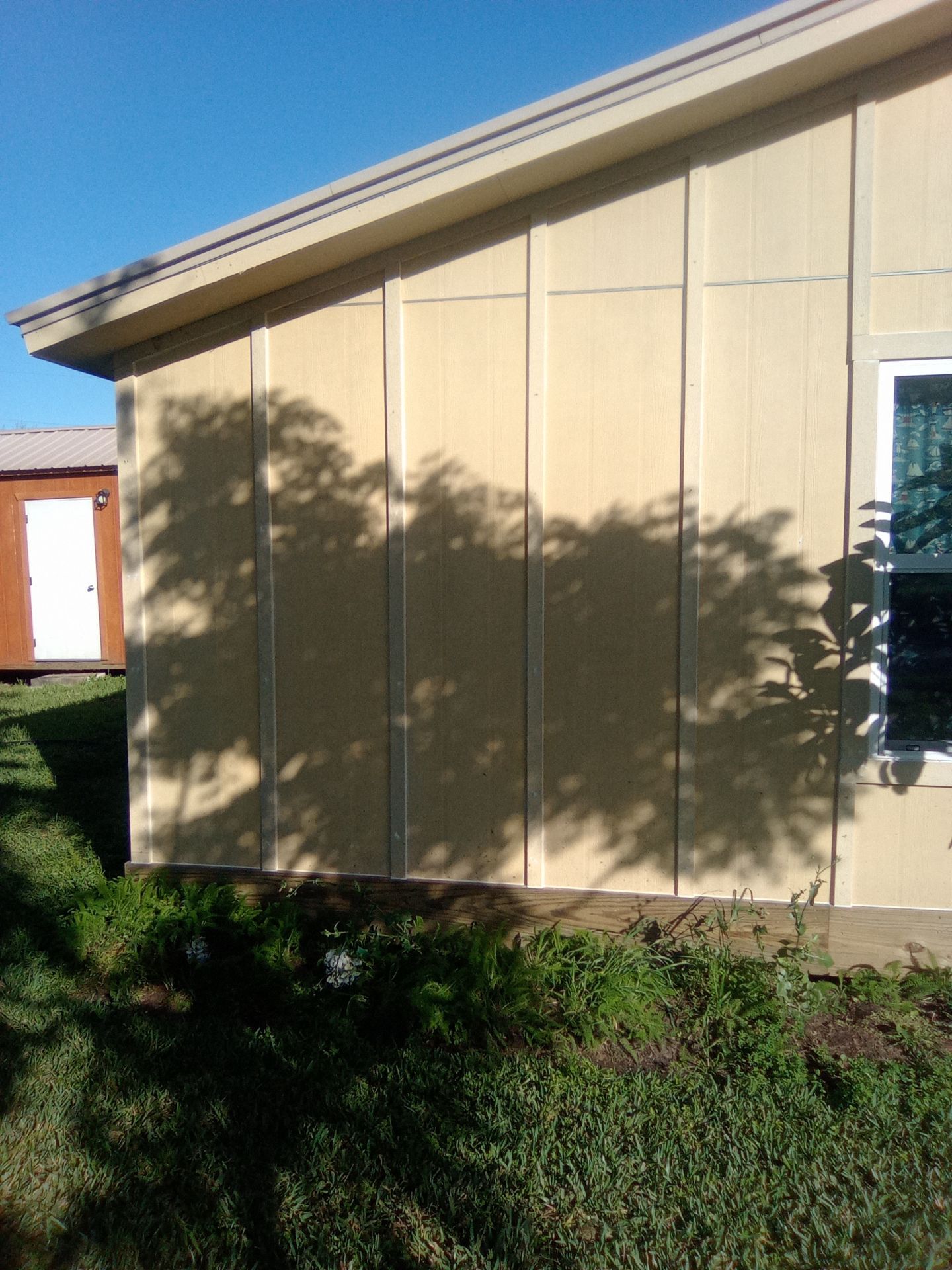 Vinyl to Hardie by Bayfront Roofing and Construction