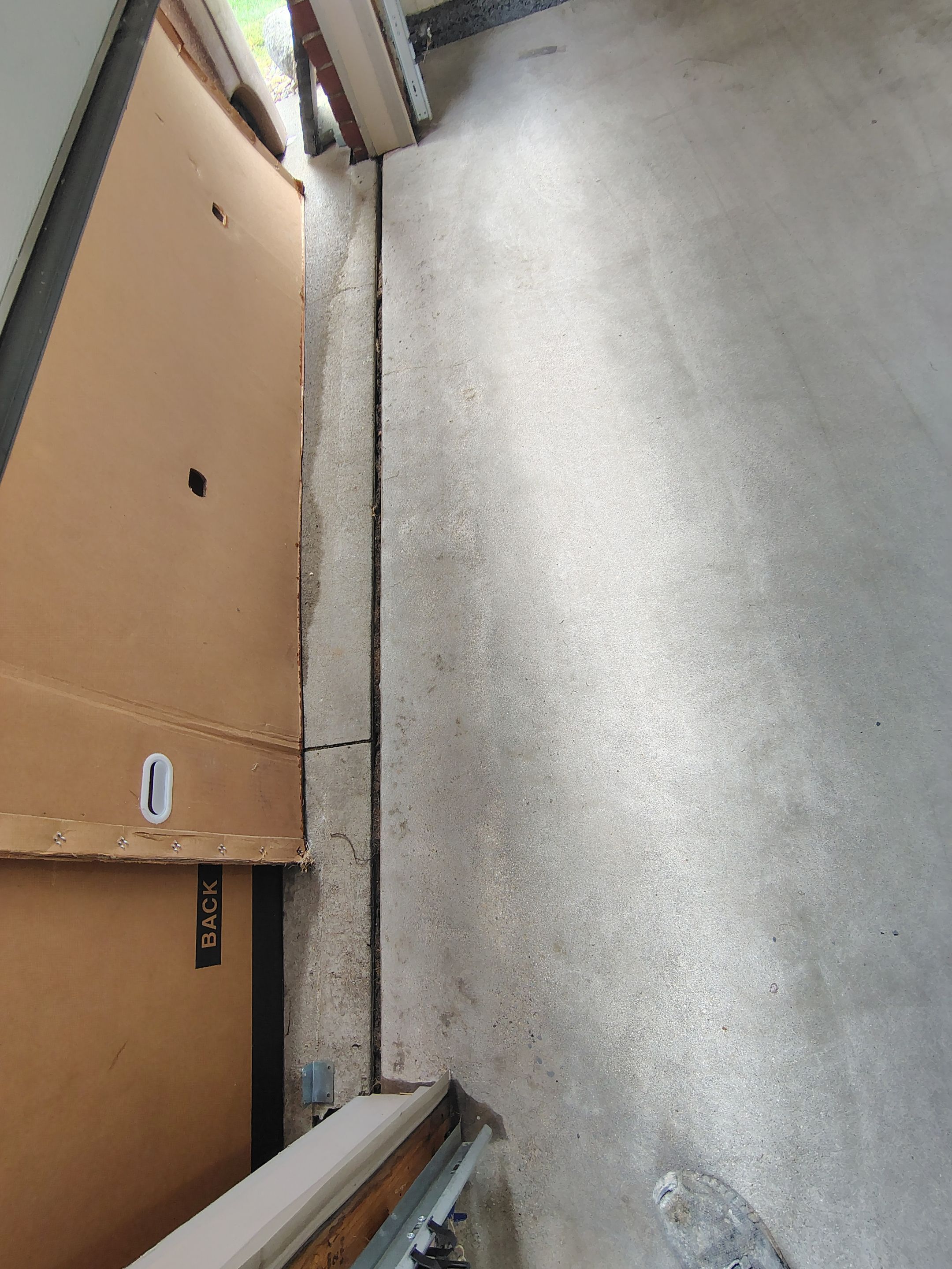 Sioux Falls Garage Concrete Grinding and Nightfall Decorative Chip Coating by Select Painting, Coatings & Garage Cabinets