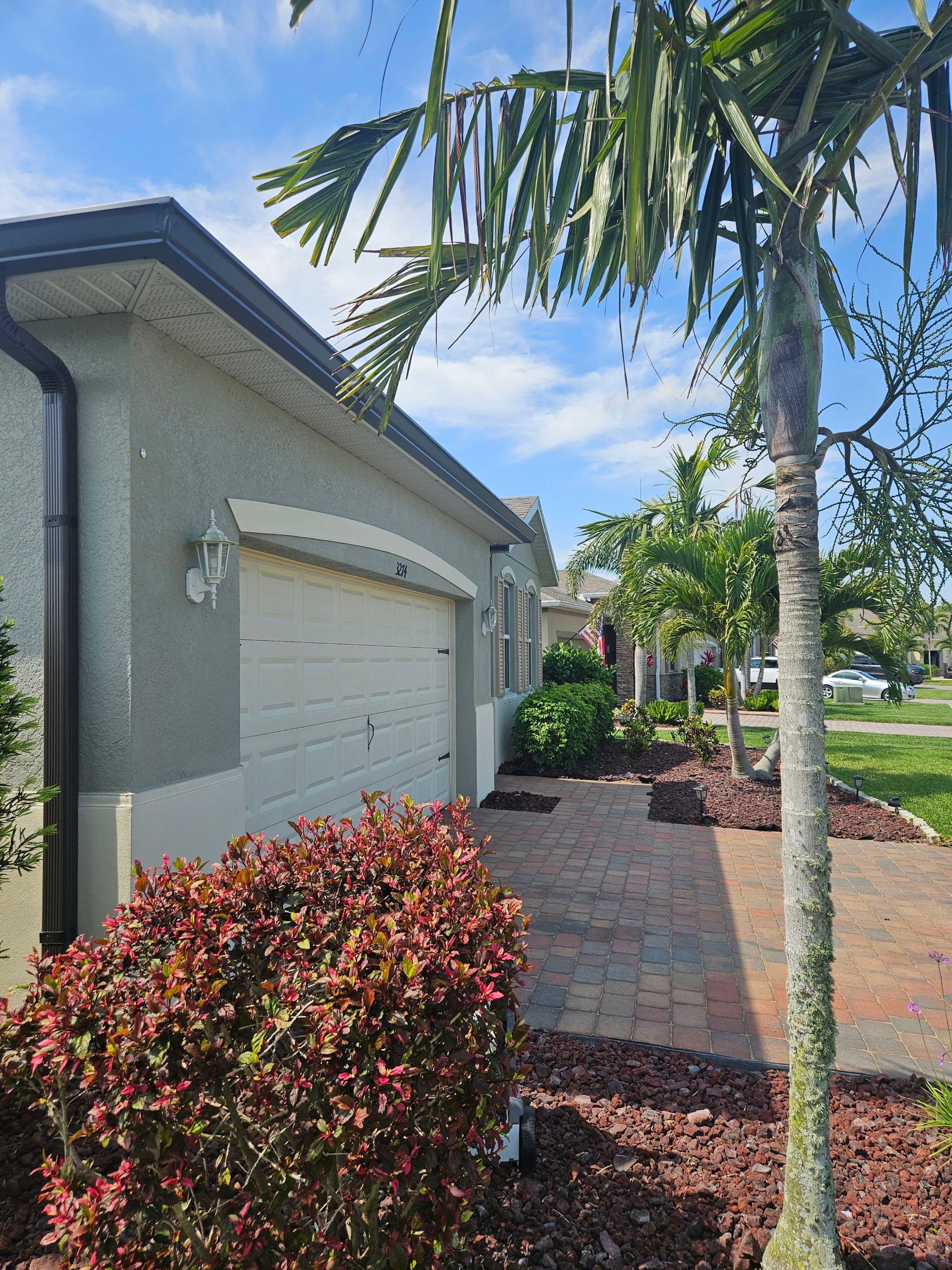6-inch Seamless Aluminum Gutter Installation using Bronze gutters and Downspouts in Cape Coral FL by Gutter Professors