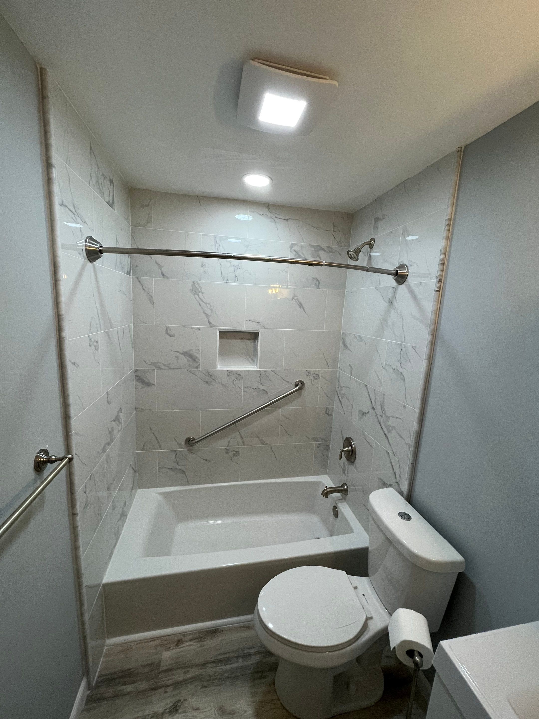 Bathroom Remodel using Tile by Home Concepts Construction