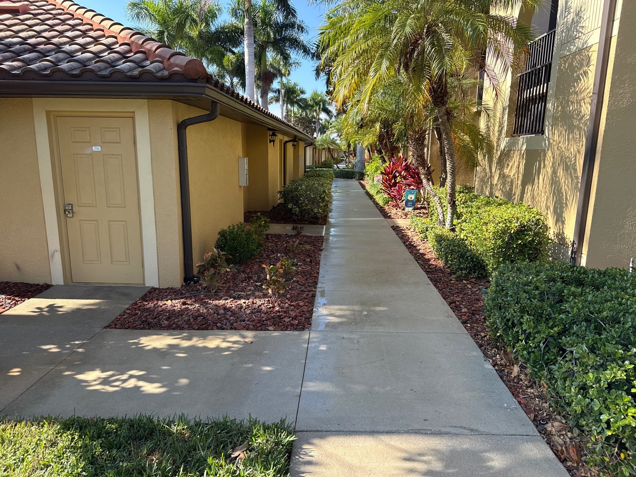 HOA Condo Concrete Driveway & Sidewalk Cleaning – River Strand Community, Bradenton, FL by Sunshine AquaWash