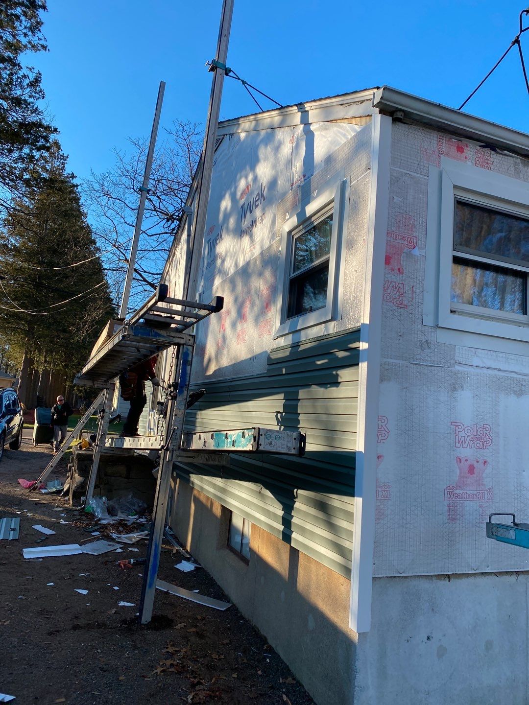 Siding Installation using Certainteed Mainstreet Forest Green by A Plus Exterior