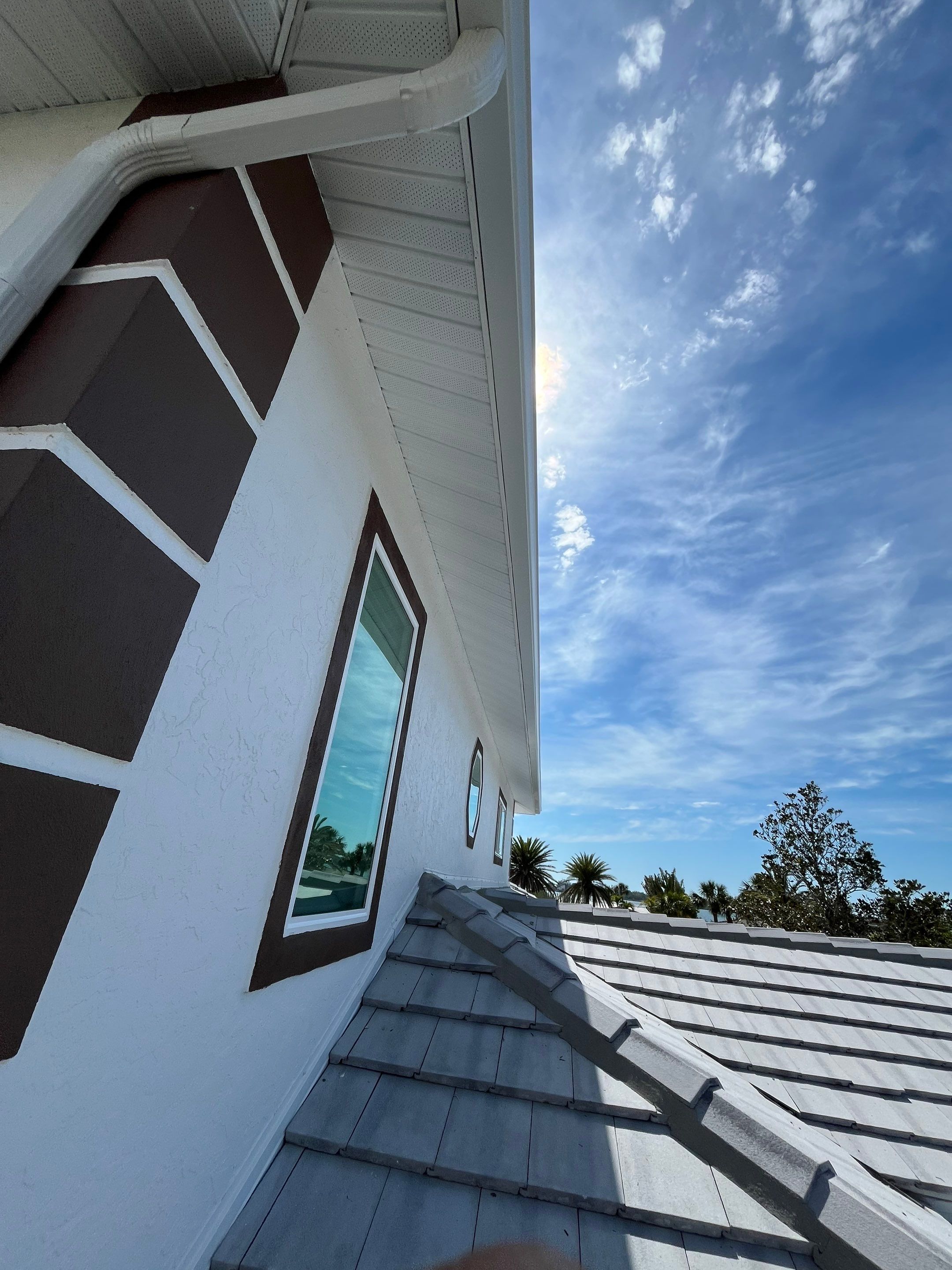 Repainting and Upgrading Gutters in Sarasota FL by Gutter Professors