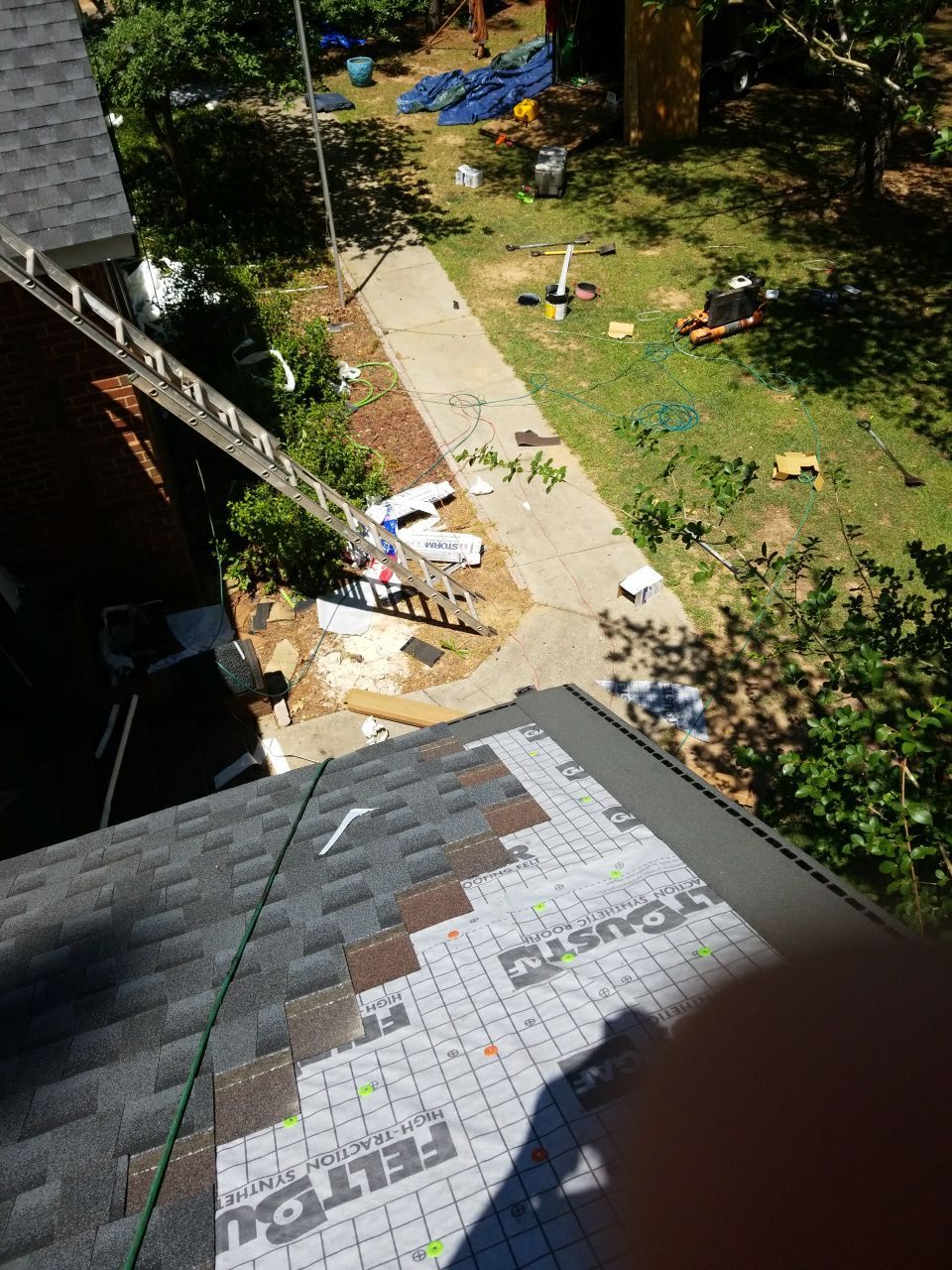 Residential Roofing Installation using Roof Replacement by American Roofing & Construction LLC