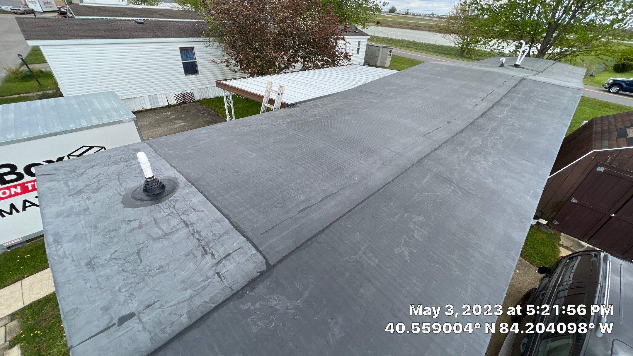 Residential Roofing Installation using 60 mil rubber roof  by Nitro Roofing and Construction