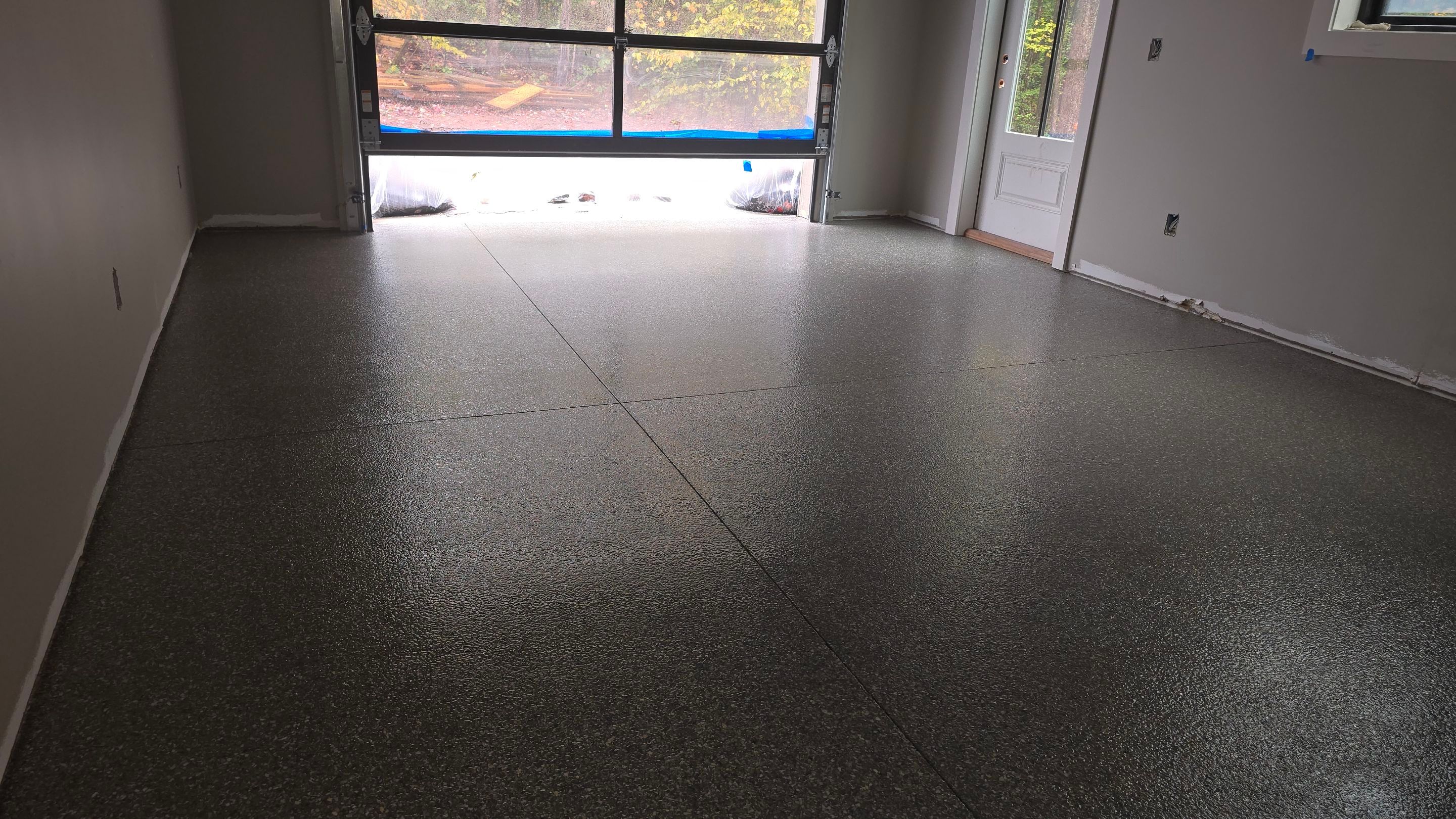 Shop Floor Using Custom Flake by Elite Floor Solutions