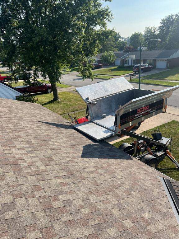 Residential Roofing Repair using Ridge vent replacement by Nitro Roofing and Construction