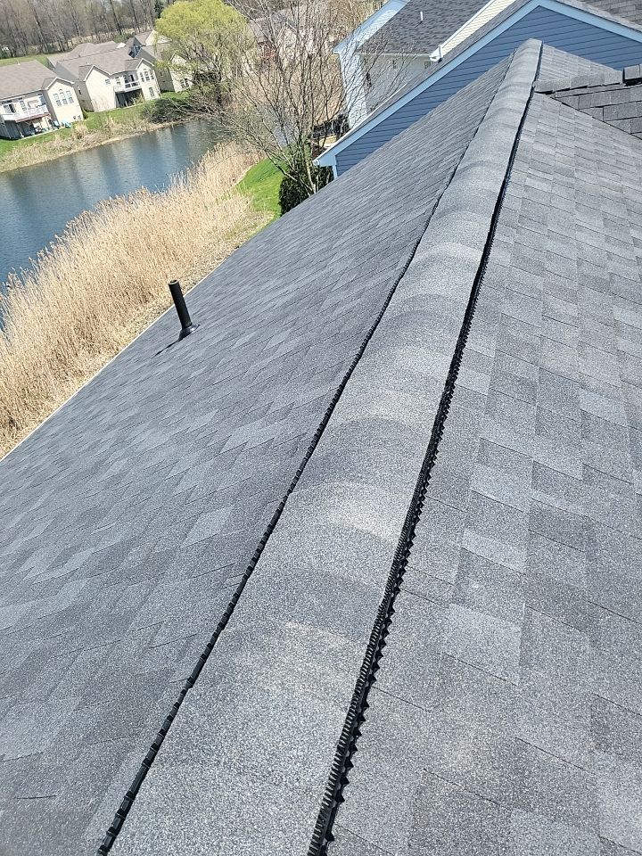 ATLAS PINNACLE COLOR: BLACK SHADOW DRIP EDGE: WHITE by Eagle Eye Roofing