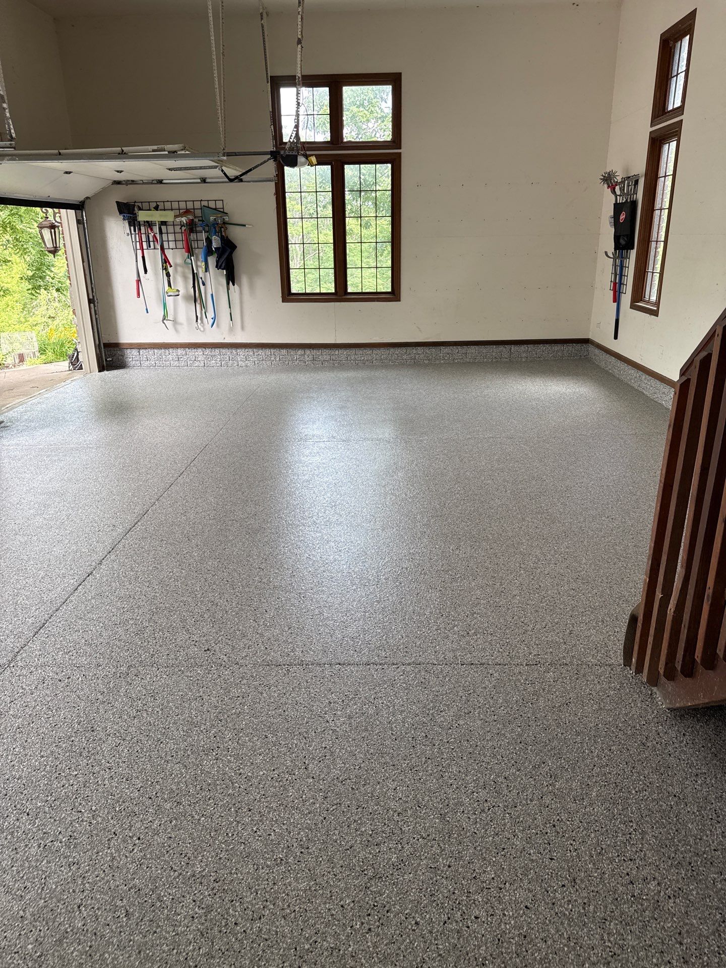 Coyote Flake Epoxy Garage Floor Coating in Earlham by Revival Concrete Coatings