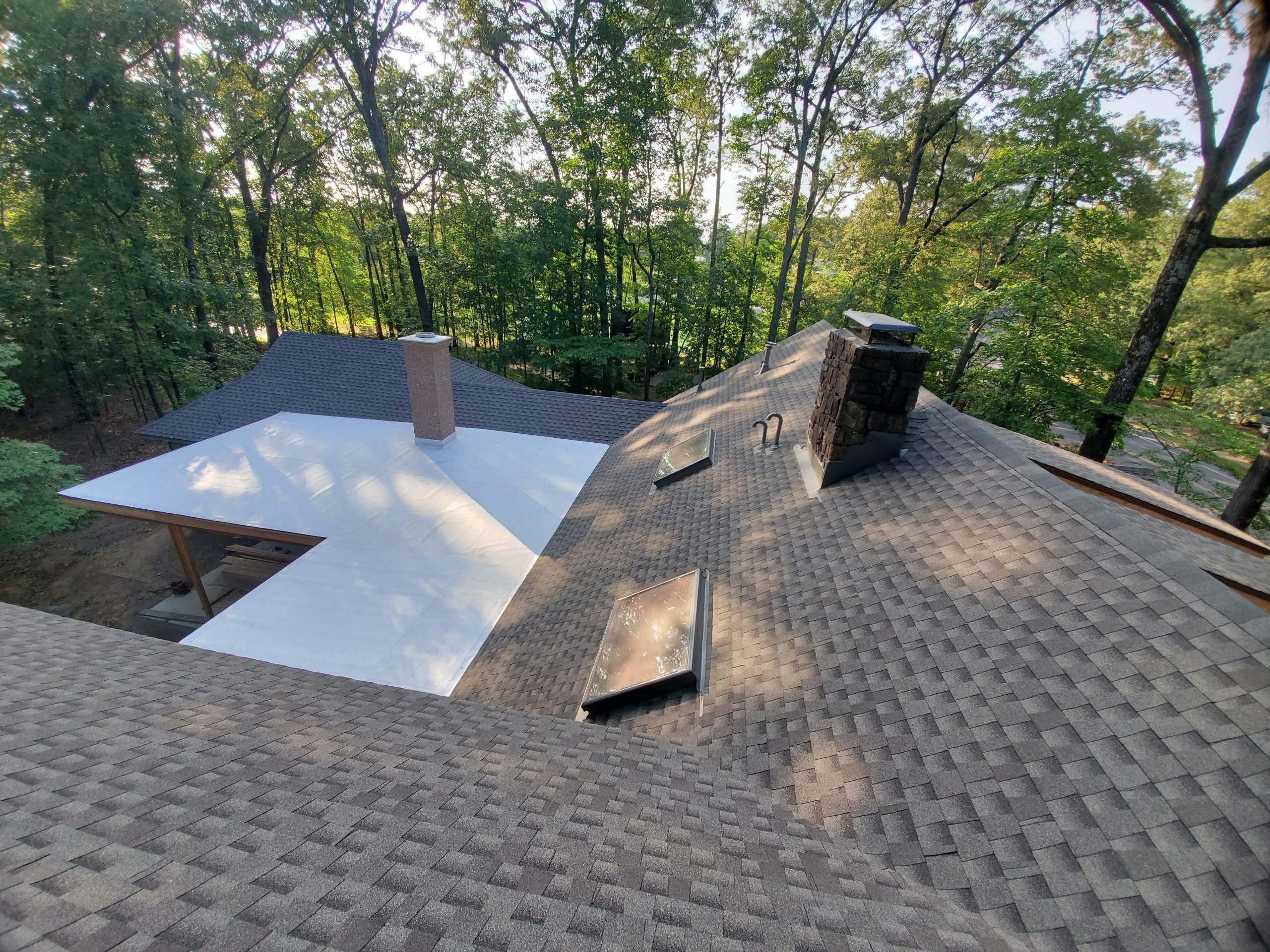Residential Roof Replacement and Flat Roof Membrane in Memphis by Revival Roofing Services