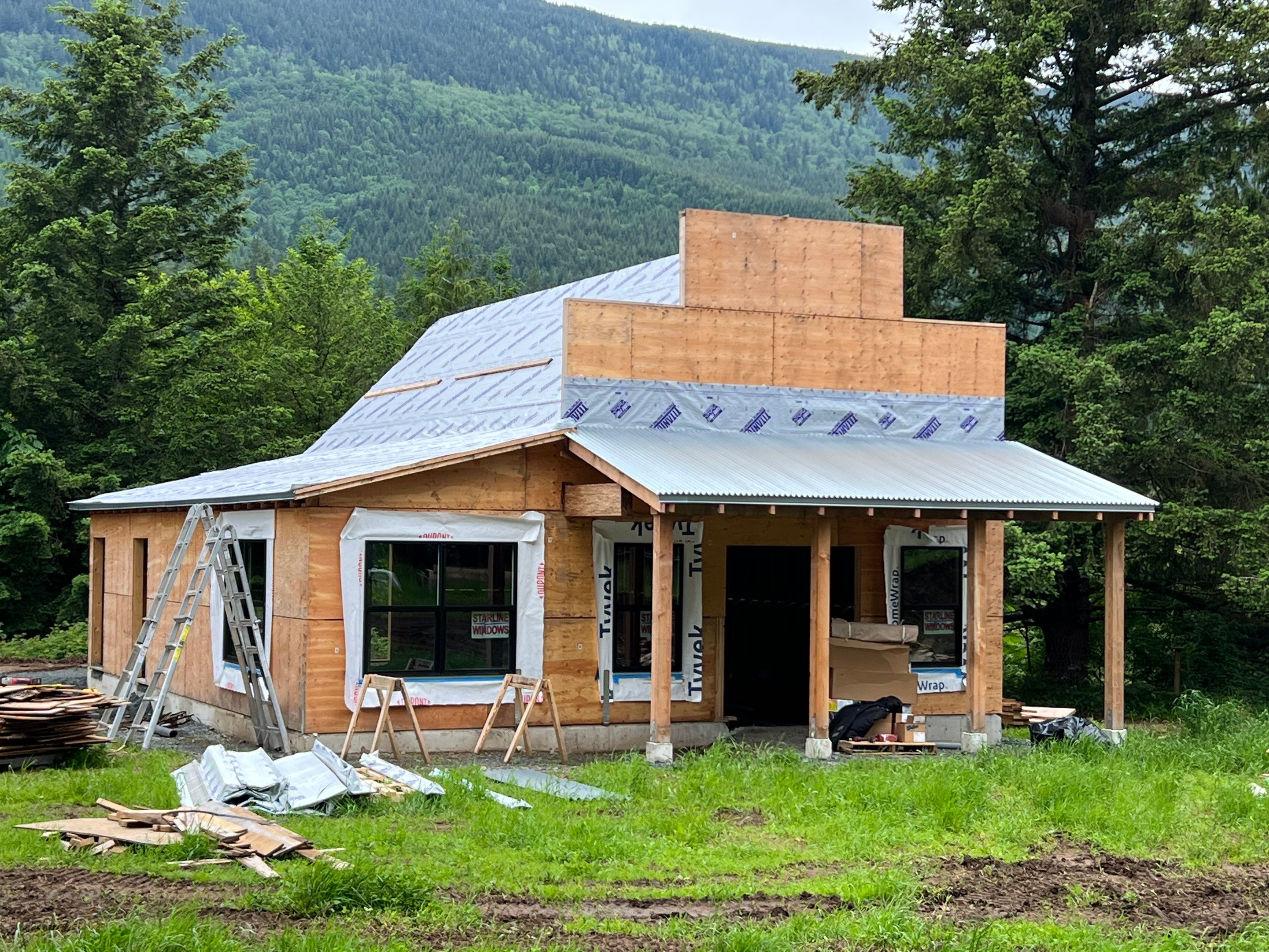 Commercial Roofing Installation using corrugated metal by Top Notch Roofing Inc